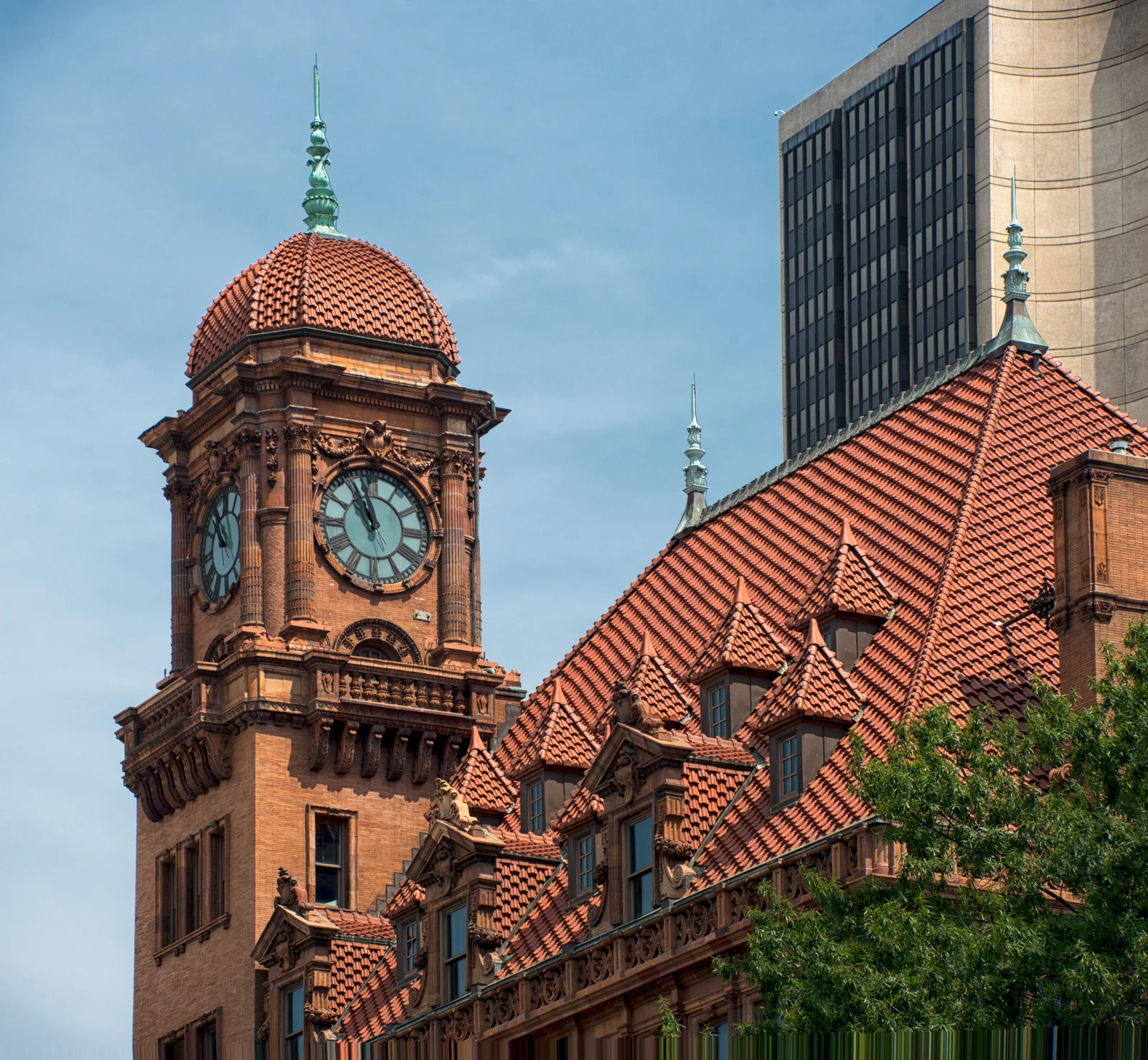 Here's a close-up of the ornate roof and clock tower. The building in the background is the James Monroe Building. It's the tallest building in Richmond, but as contrasted against Main Street Station, it's a mundane and depressing pile of steel, glass, and concrete.