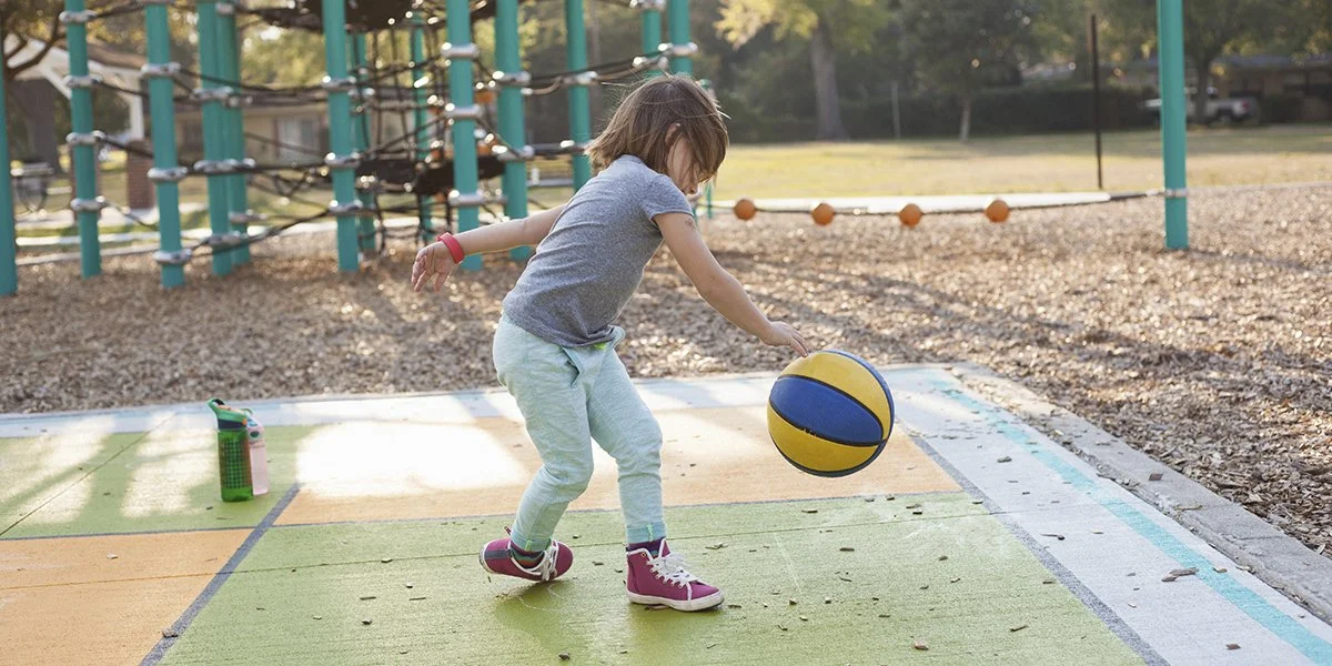girl-bouncing-basketball-in-playground-2026-01-09-11-32-09-utc.jpg