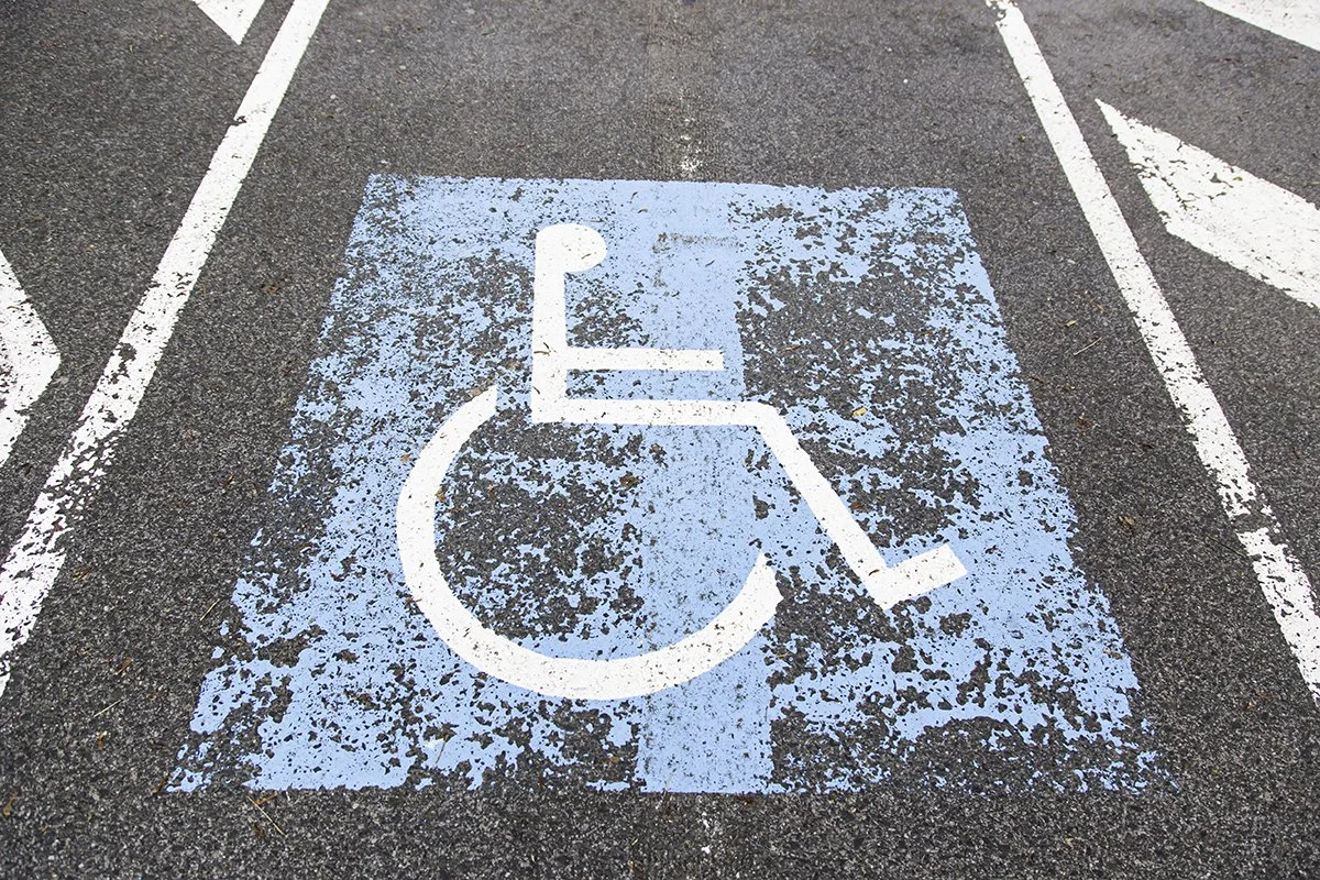 handicap-parking-space-symbol-on-asphalt-pavement-2026-09-24-19-48-37-utc.jpg