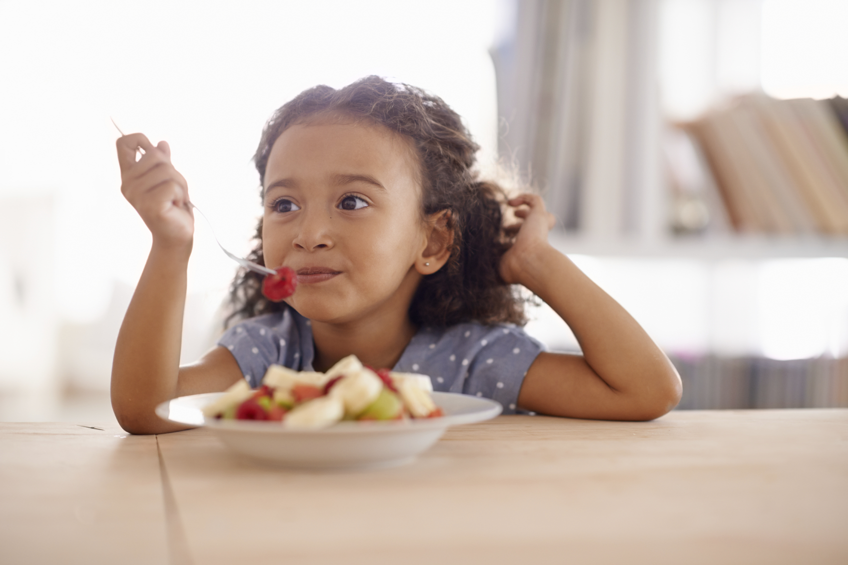 childwithfruit.jpg