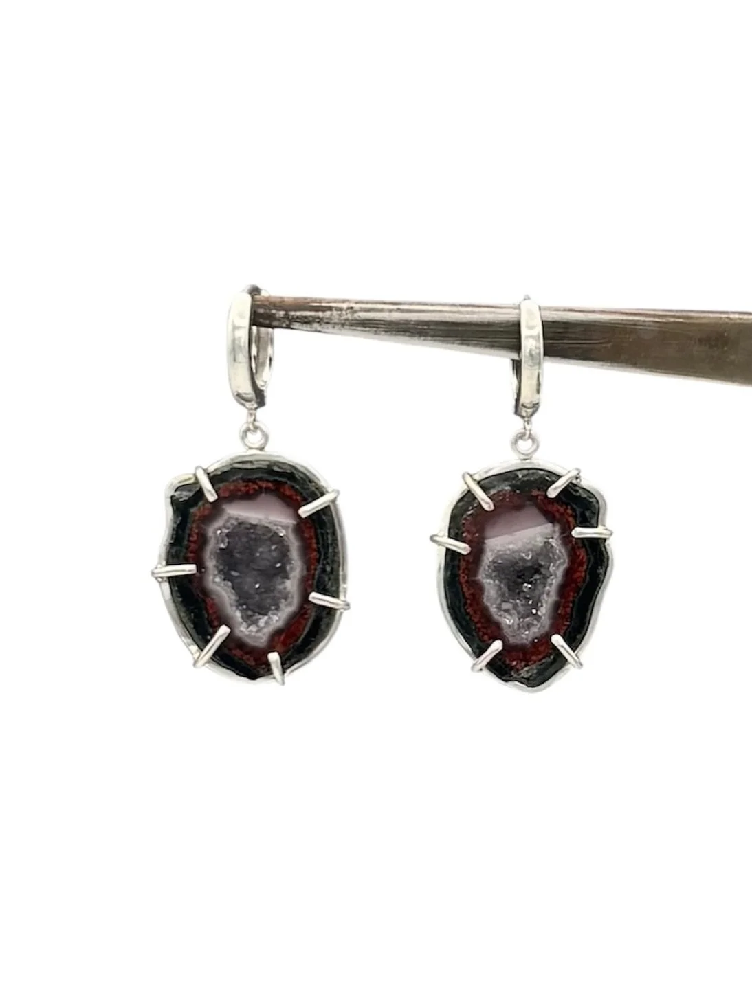 Unique, one-of-a-kind Tabasco Geode earrings with hinged clasps. These beauties are some of the smallest geodes in the world, found in Tabasco, Mexico. Each one has a tiny cluster of sparkly quartz crystals at its center. A little world of natural wo