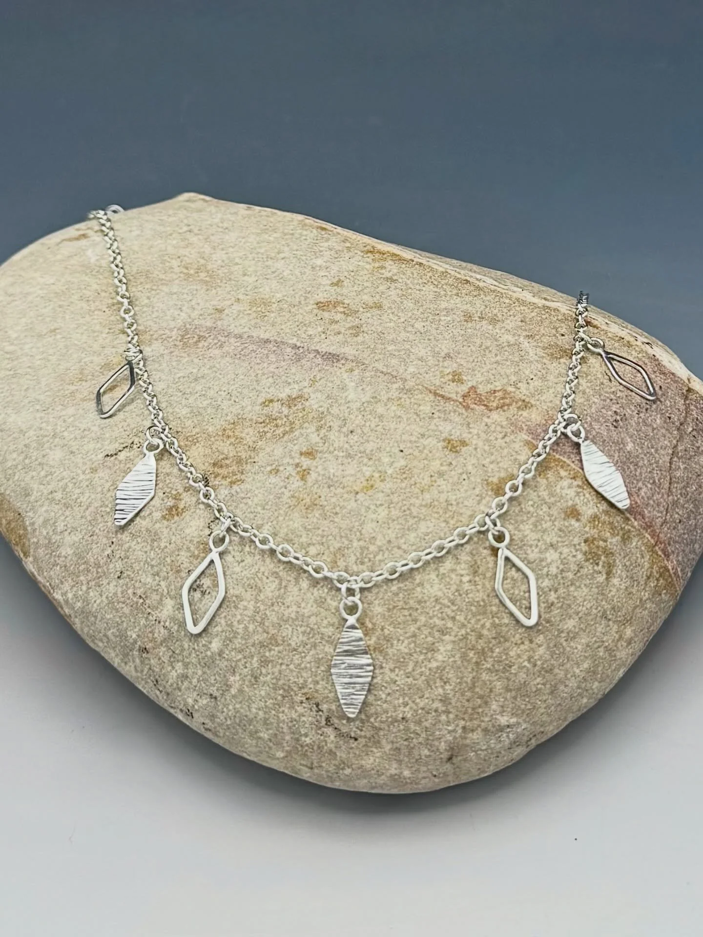 Dainty petals necklace. The spring-inspired collection is slowly making its way to the website!