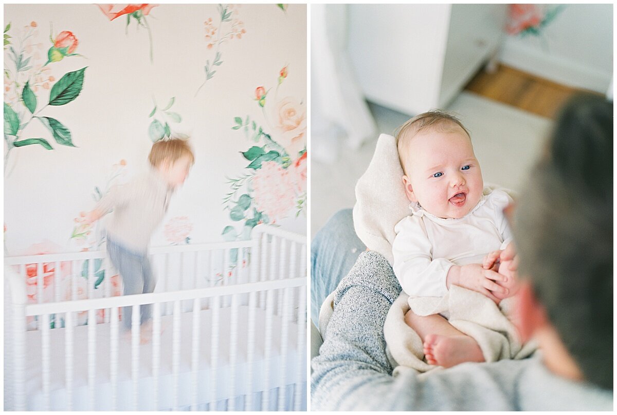 A toddler jumping in a crib and a baby on her father's lap during a DC Newborn session.