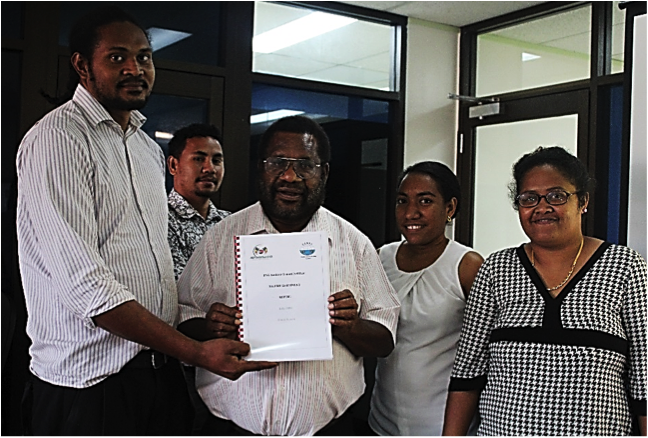 (L-R): Presentation of the SAI PMF Assessment Report by Project Team Leader Mr To’oro Aveve A/Manager – Training and Development, Mr Benly Micah Senior Technical Officer – Standards, Ms Dallas Kila Senior Technical Officer – Monitoring presenting the report to Mr Gordon Kega , Acting Deputy Auditor General, Provincial & Local Level Government Audit Divisionand Executive Officerof the Auditor General Ms CatherineAdiunegiya