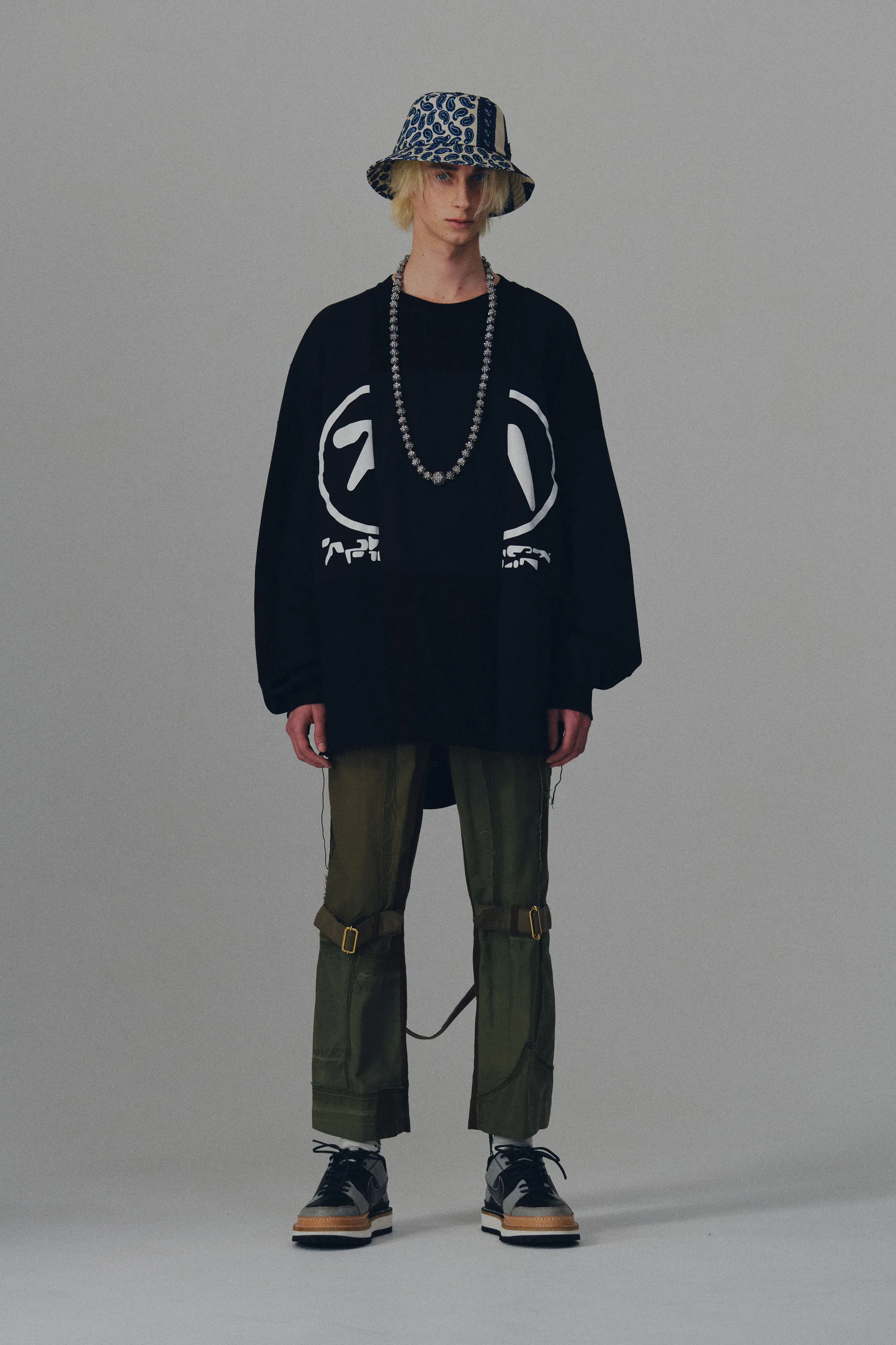 00021-Children-of-the-Discordance-Mens-Fall-22-credit-brand.png