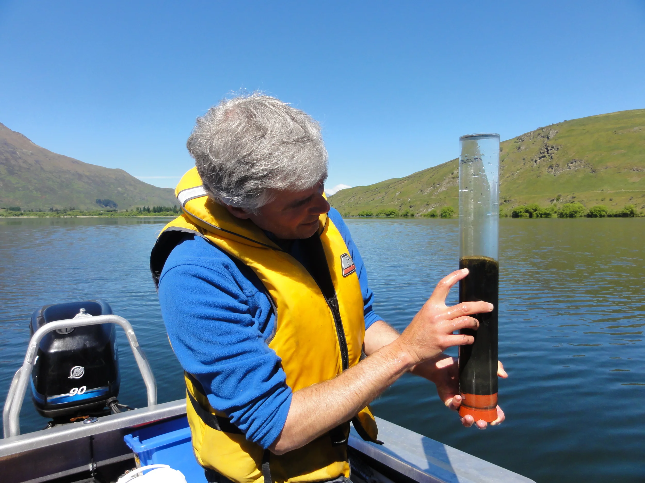Examining the sediment-water interface of Lake Hayes. Photo courtesy of Marc Schallenberg