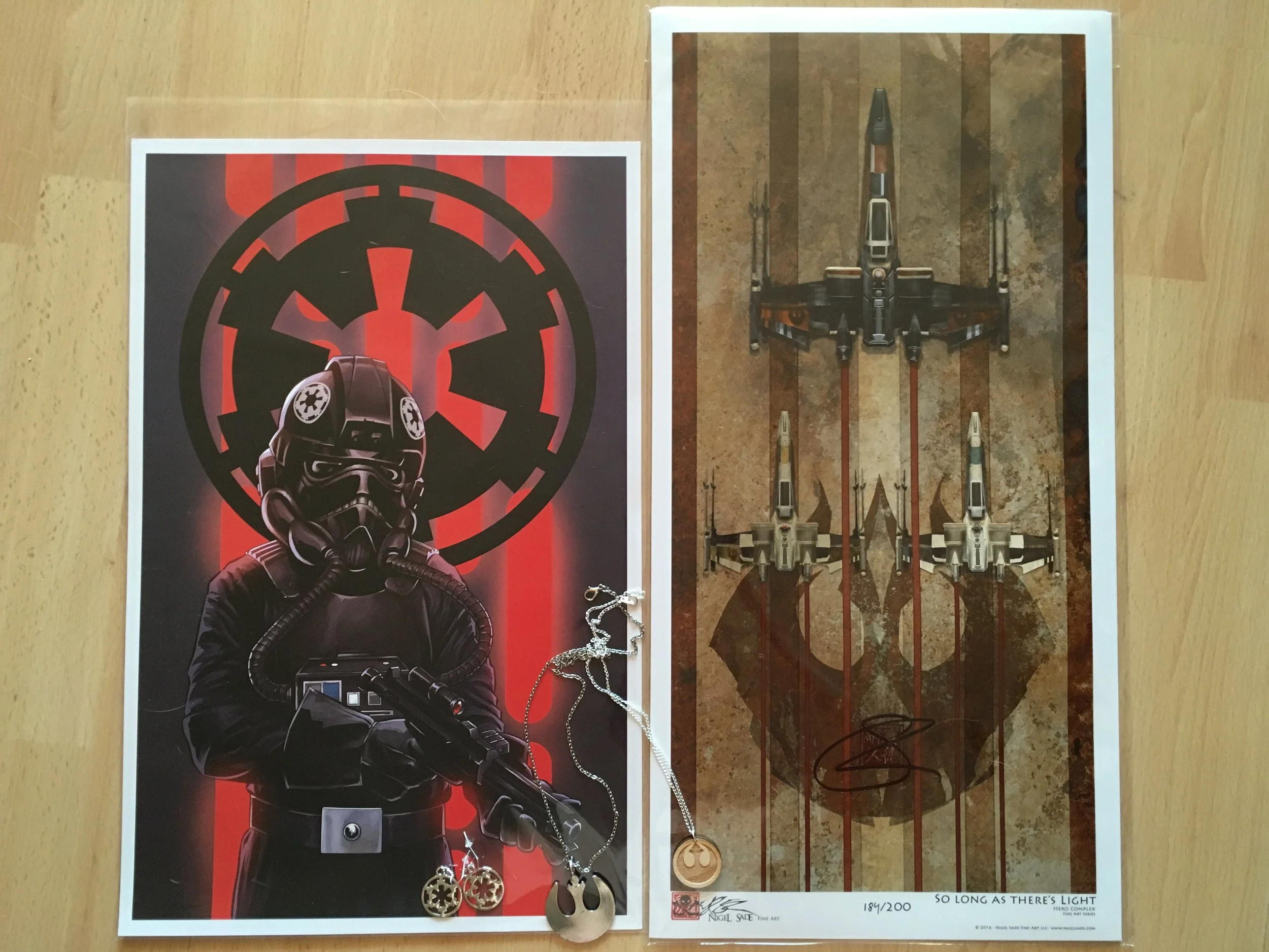 Con swag: art and jewelry! True to form, my haul was 50% Imperial, 50% Rebel. 