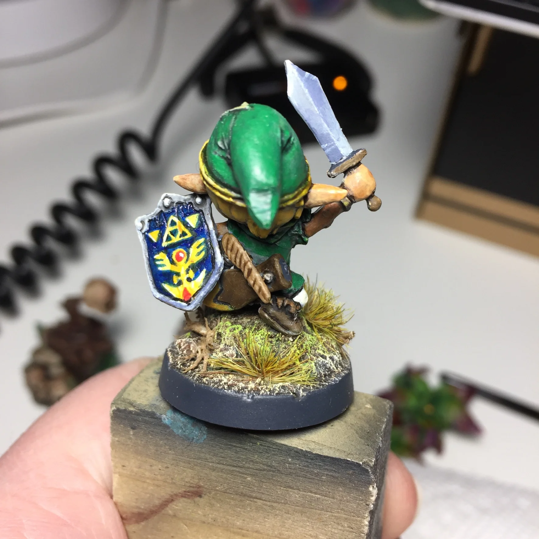 This was one of my first attempts at freehand (on the shield) and a good practice session for non metallic metal (on the sword). Overall it was a really fun 6 hour project (still needs basing though).