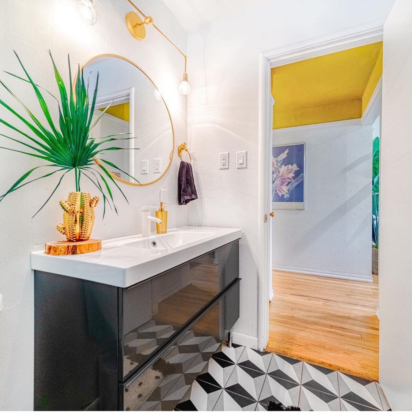 I love these listing photos of my master and guest bath. It&rsquo;s amazing what new floor tile and @ikeausa vanities can do to a space. Of course adorable accessories and lighting from @sazerac_stitches is the icing on the cake. #bath #bathroom #bat