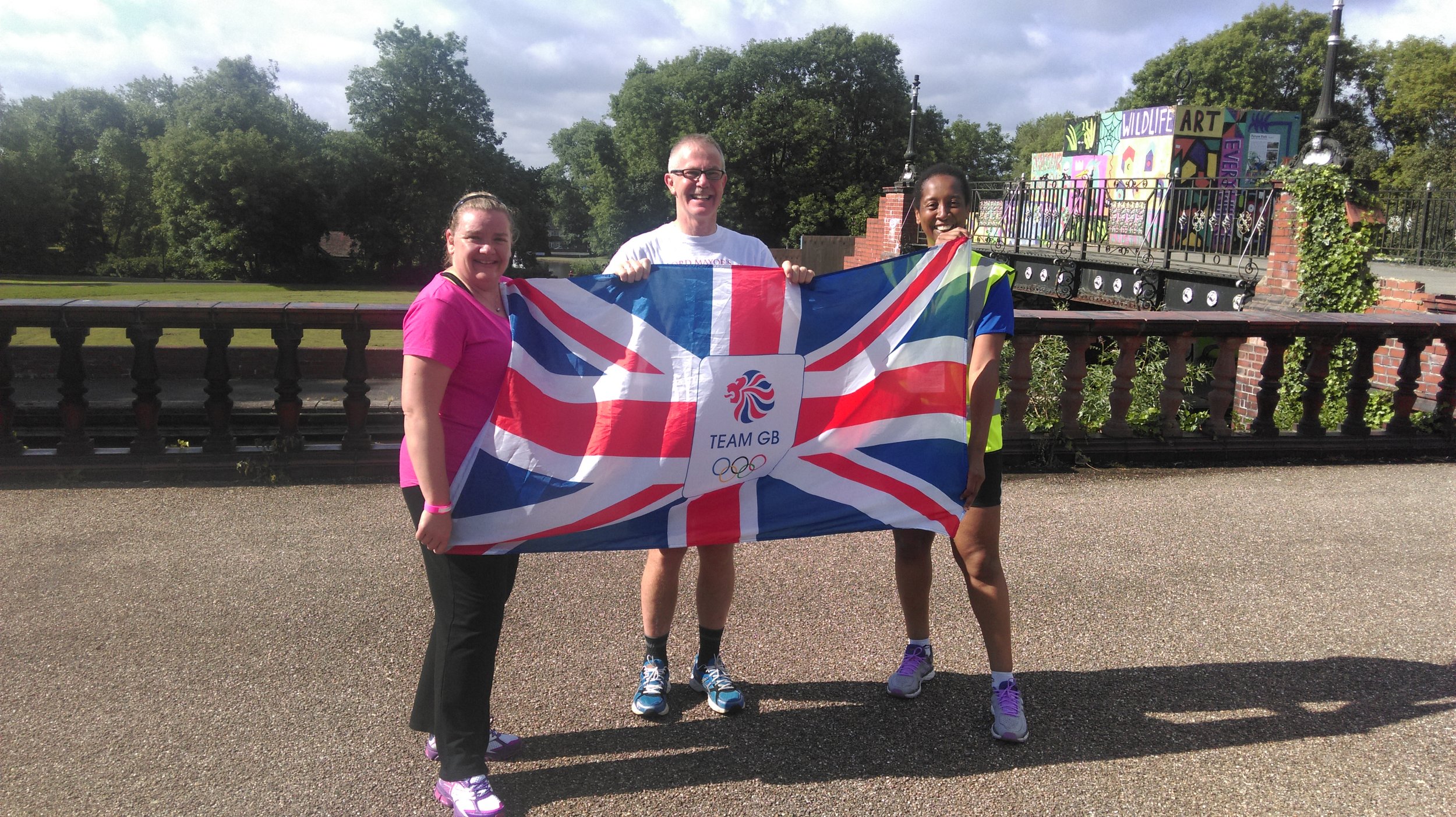 Lord Mayor Anthony Munday supporting TeamGB, with help from Hanley parkrunners