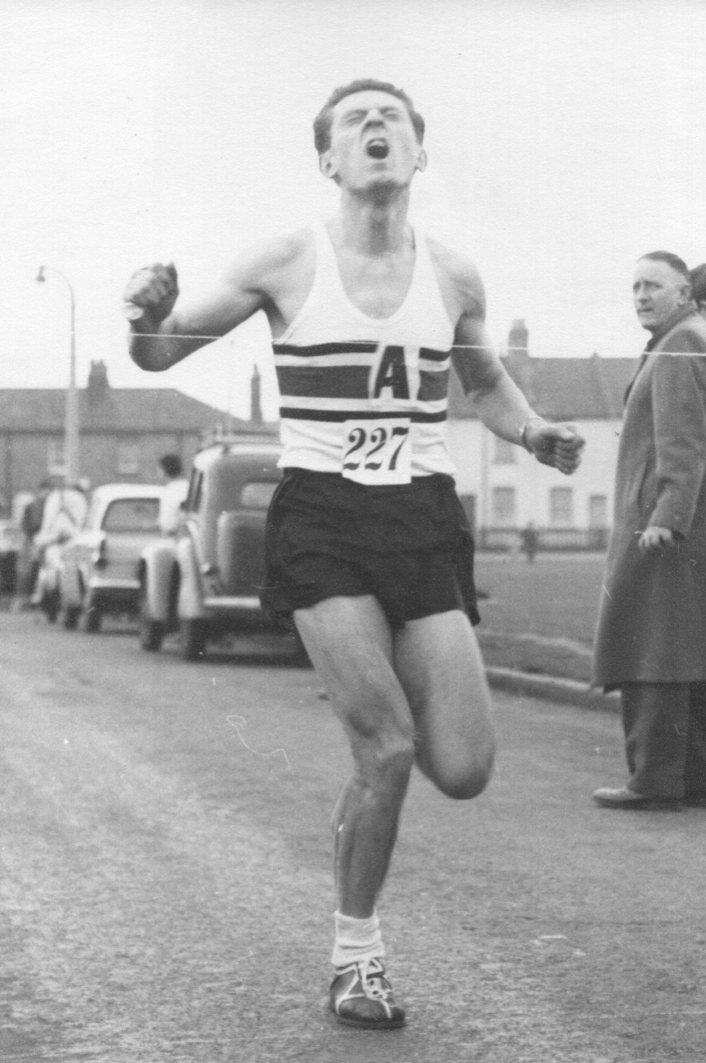 Don winning the Mitcham 25km road race, 1962