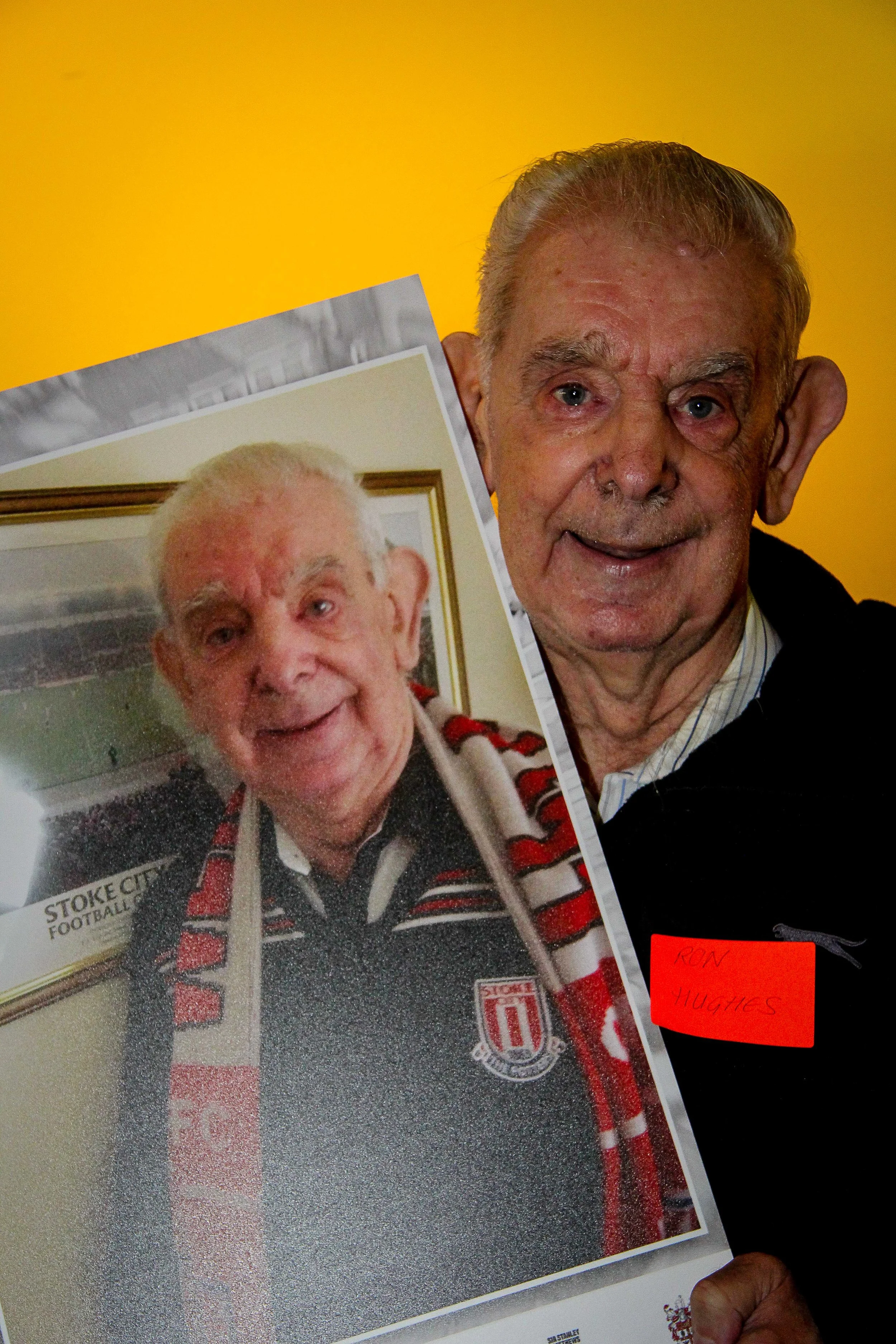 Ron, lifelong Stoke City fan, with a copy of his photo from the book