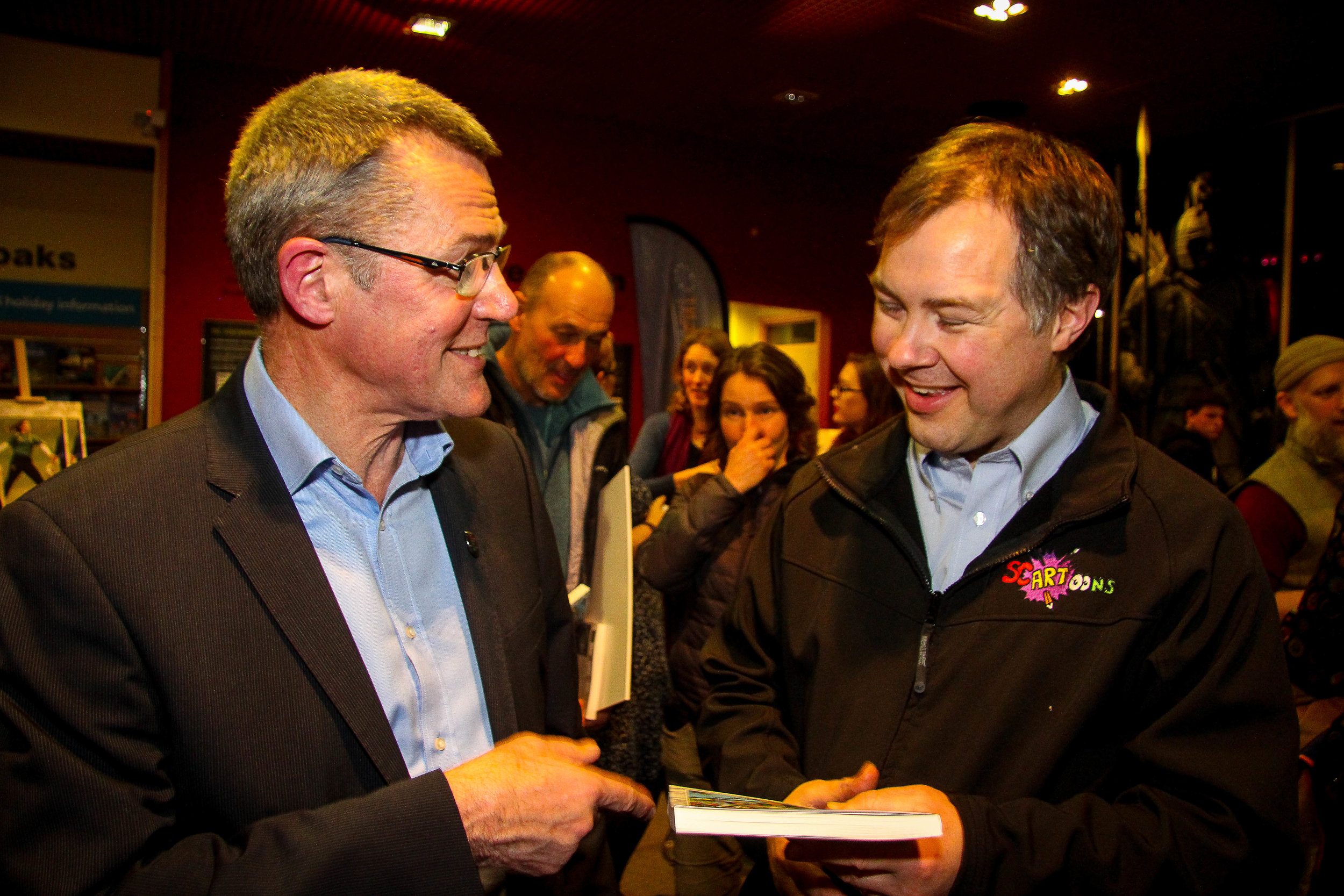 Sharing a joke with Simon, a local cartoonist whose work features in the book