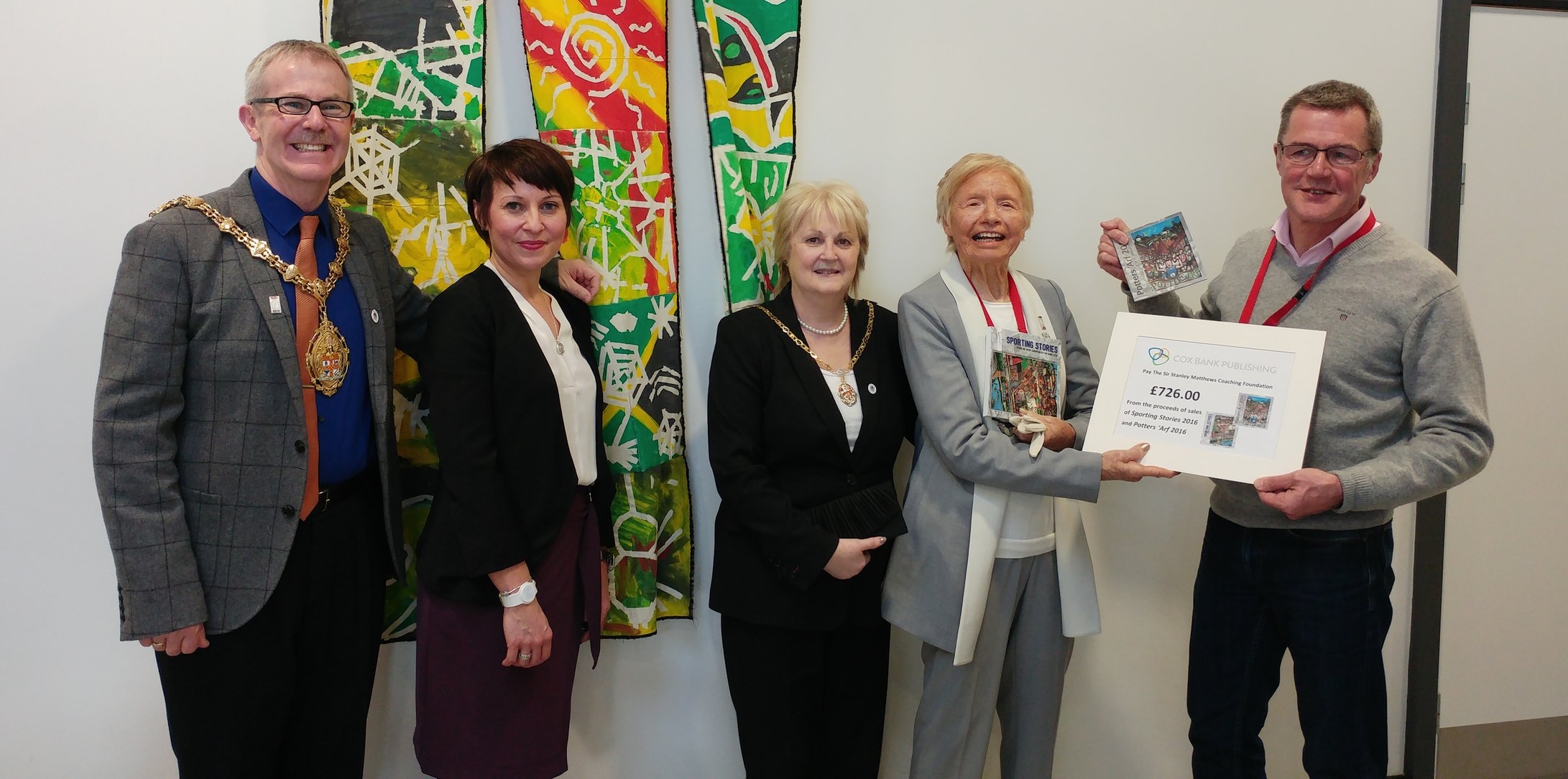 Peter Hooper handing over the cheque to Jean Gough, with (left to right): Stoke-on-Trent's Lord Mayor Anthony Munday; Lisa Hughes, headteacher at Kemball School; and Lady Mayoress Paula Munday