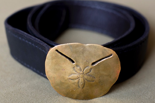 Sand dollar on plain belt. Brass and silver. Variable sizes.