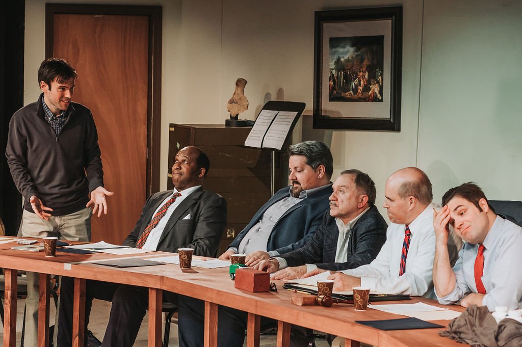  As Mr. Peel with the cast of Tracy Letts’s The Minutes at Shaker Bridge Theater (2024) Photo by Caitlin Gomes. 