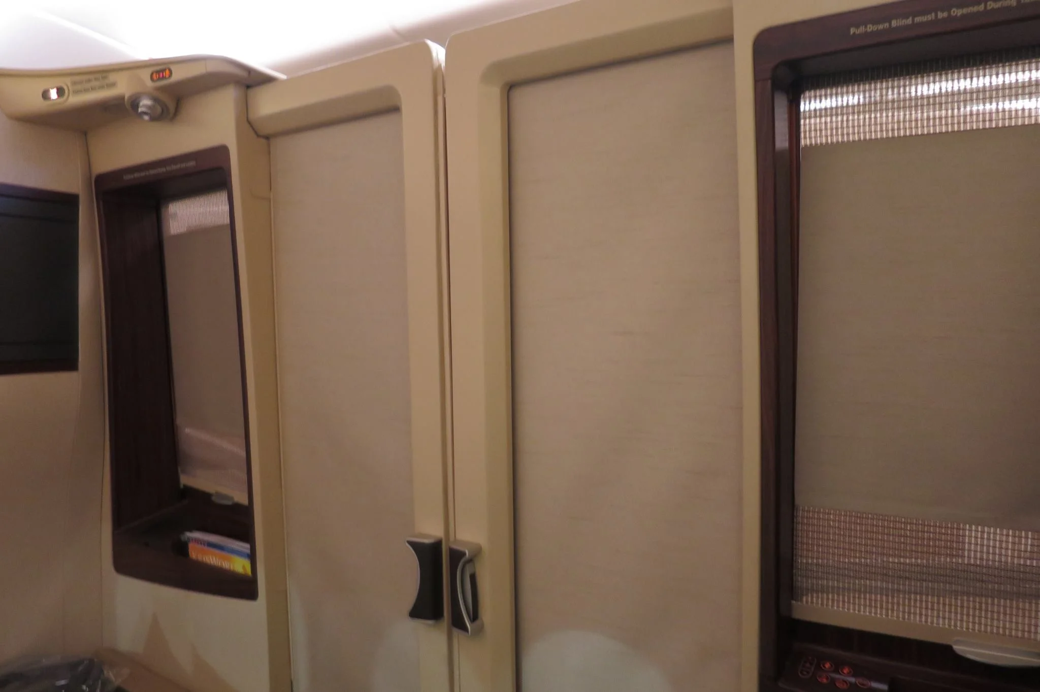 Suite with the door closed. After a lifetime of flying economy and being able to try various business and first class products on occasion, I cannot overstate just how amazing it feels to have privacy on a plane. I think that is the ultimate luxury