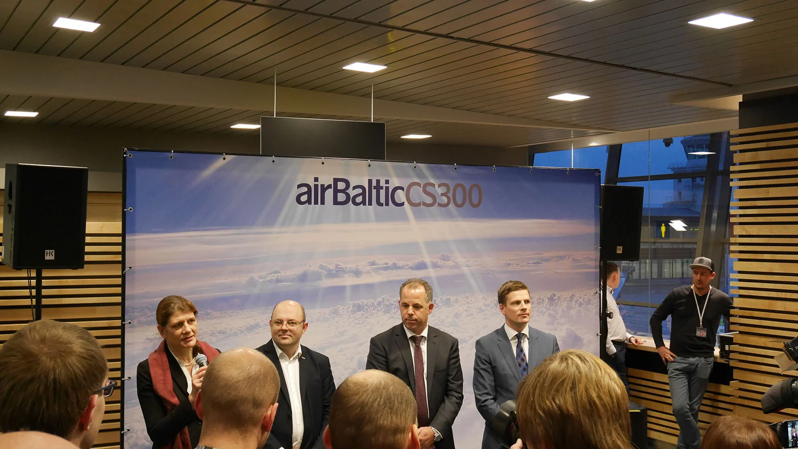 airBaltic execs and the Latvian ambassador to the Netherlands giving a speech