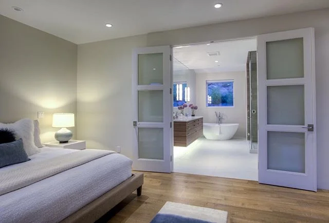 French doors lead to a gorgeous ensuite master bath you won't ever want to leave. Grab your favorite book and fill up a bath - don't skimp on the bubbles! #basalt #colorado #masterbathroom #masterbedroom #home #house #architecture #design #architectu