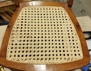 Hand caning is the traditional method of caning and has been around for centuries. By using individual strands of cane material, the caner achieves the final pattern by weaving one strand at a time. There are several techniques such as: Traditional, French, and binder hand caning. Cane patterns can vary in size and style. Hand cane pieces generally carry more value as they become more rare in the antique world. 