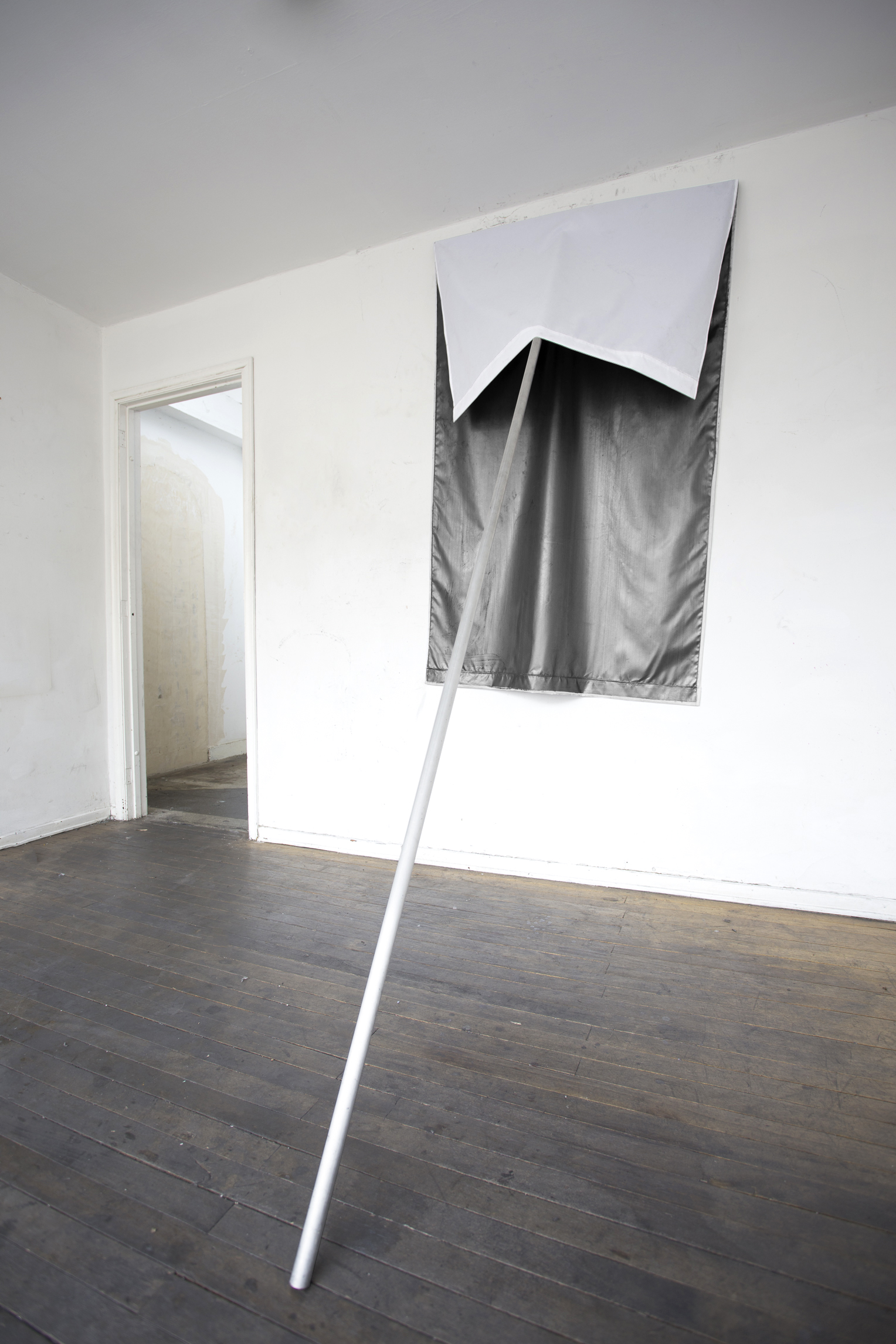   Santiago Reyes Villaveces  ©  2014 ,  Flag . Wood, graphite and fabric. 98.4 x 39.3 x 59 in (250 x 100 x 150 cm). Courtesy of the artist. 