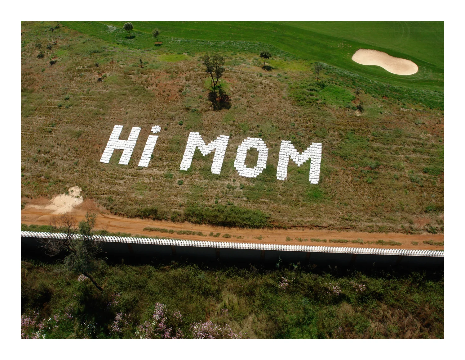 Hi MOM  2010-2014    Polypropylene Sandbags, Sand    6" H   100' W   20' D 