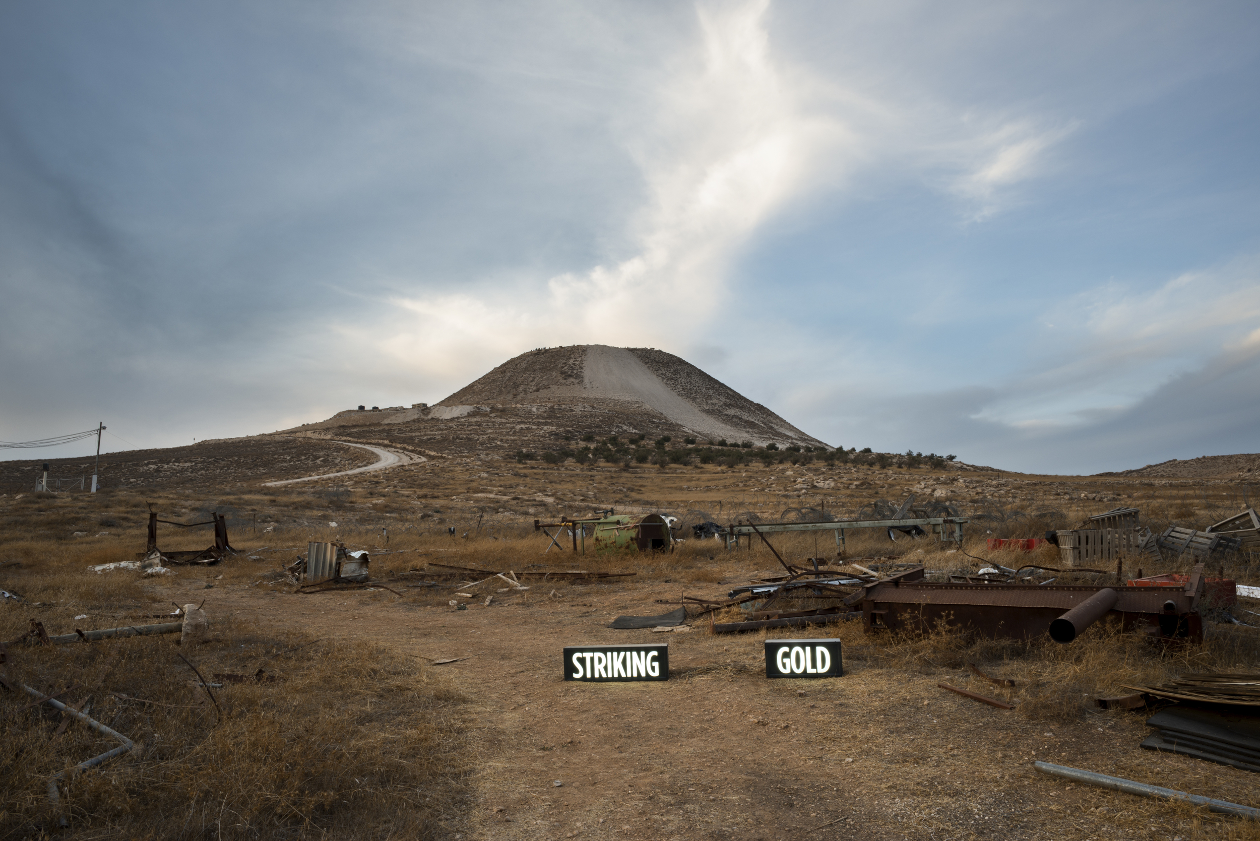 Image above: ©Shimon Attie, STRIKING GOLD, Two on-location light boxes, Israeli Settlement, West Bank, 2014, digital c-print / Courtesy of the artist and Jack Shainman Gallery, New York.