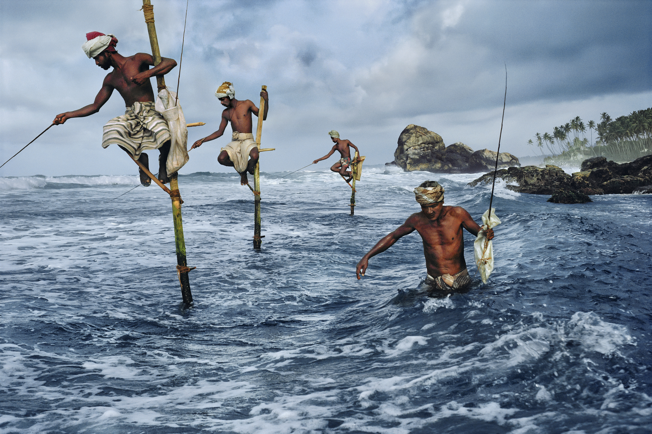 Image above: ©Steve McCurry, Stilt Fishermen, South Coast, Sri Lanka, 1995, chromogenic print on Fuji Crystal, Archive paper