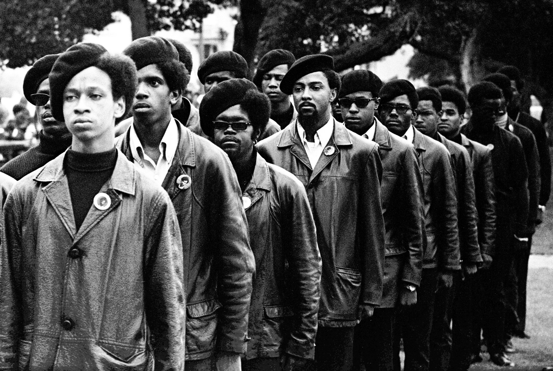 Image Above: Panthers line up at a Free Huey rally in DeFremery Park, Oakland, July 28, 1968. The light-skinned man is Gregory Harrison. His brother, Oleander, was in the group that went to Sacramento. All images: Stephen Shames, Courtesy of Steven Kasher Gallery