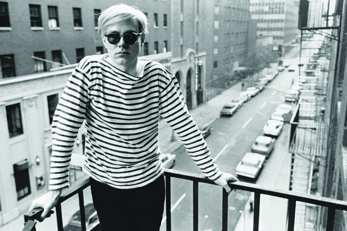 © Factory Andy Warhol by Stephen Shore, Warhol on fire escape of the Factory, 231 East 47th Street, Courtesy of Phaidon Press Inc.