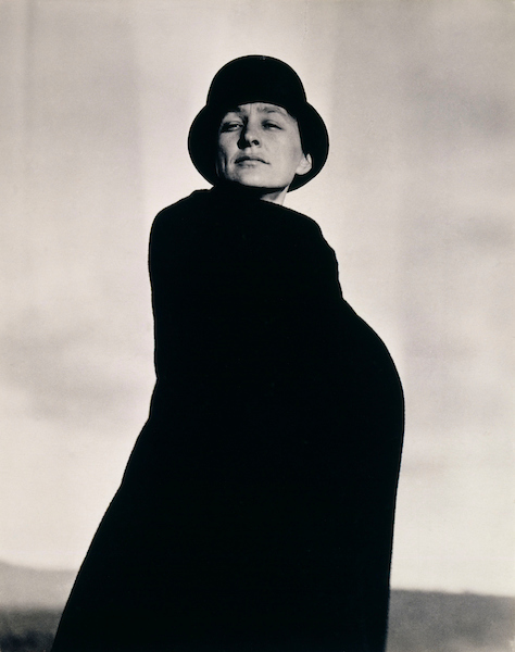 Alfred Stieglitz (American 1864-1946). Georgia O'Keeffe circa 1920-22. Gelatin silver print, 4 1/2 x 3 1/2 in. (11.4 x 9 cm). Georgia O'Keeffe Museum, Santa Fe, N.M.; Gift of The Georgia O'Keeffe Foundation, 2003.01.006. © Georgia O'Keeffe Museum