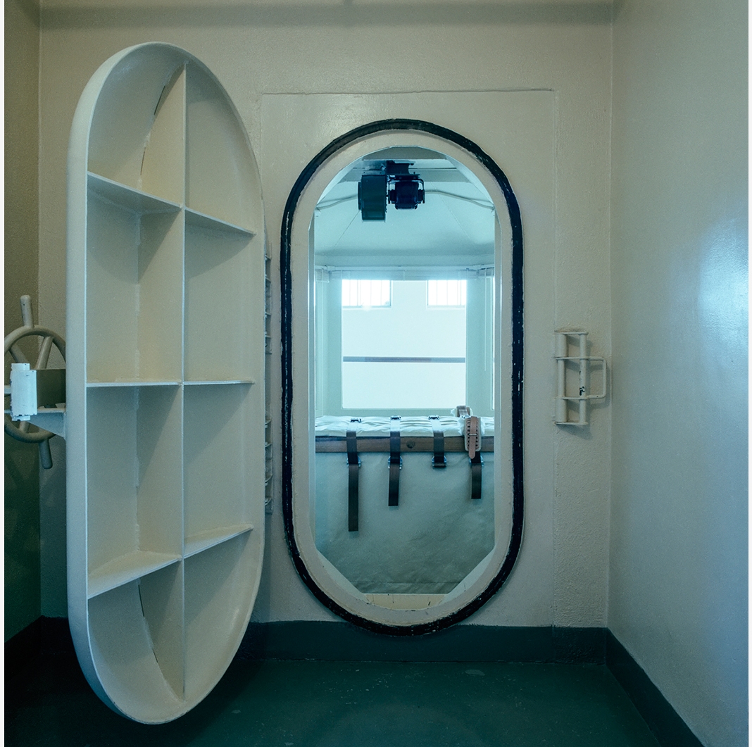 Image courtesy of the George Eastman Museum. Lucinda Devlin (American, b. 1947). Lethal Injection Chamber, Nevada State Prison, Carson City, NV , 1991. From the series The Omega Suites . Inkjet print. Courtesy of the artist and Weatherspoon Art Museum. © Lucinda Devlin