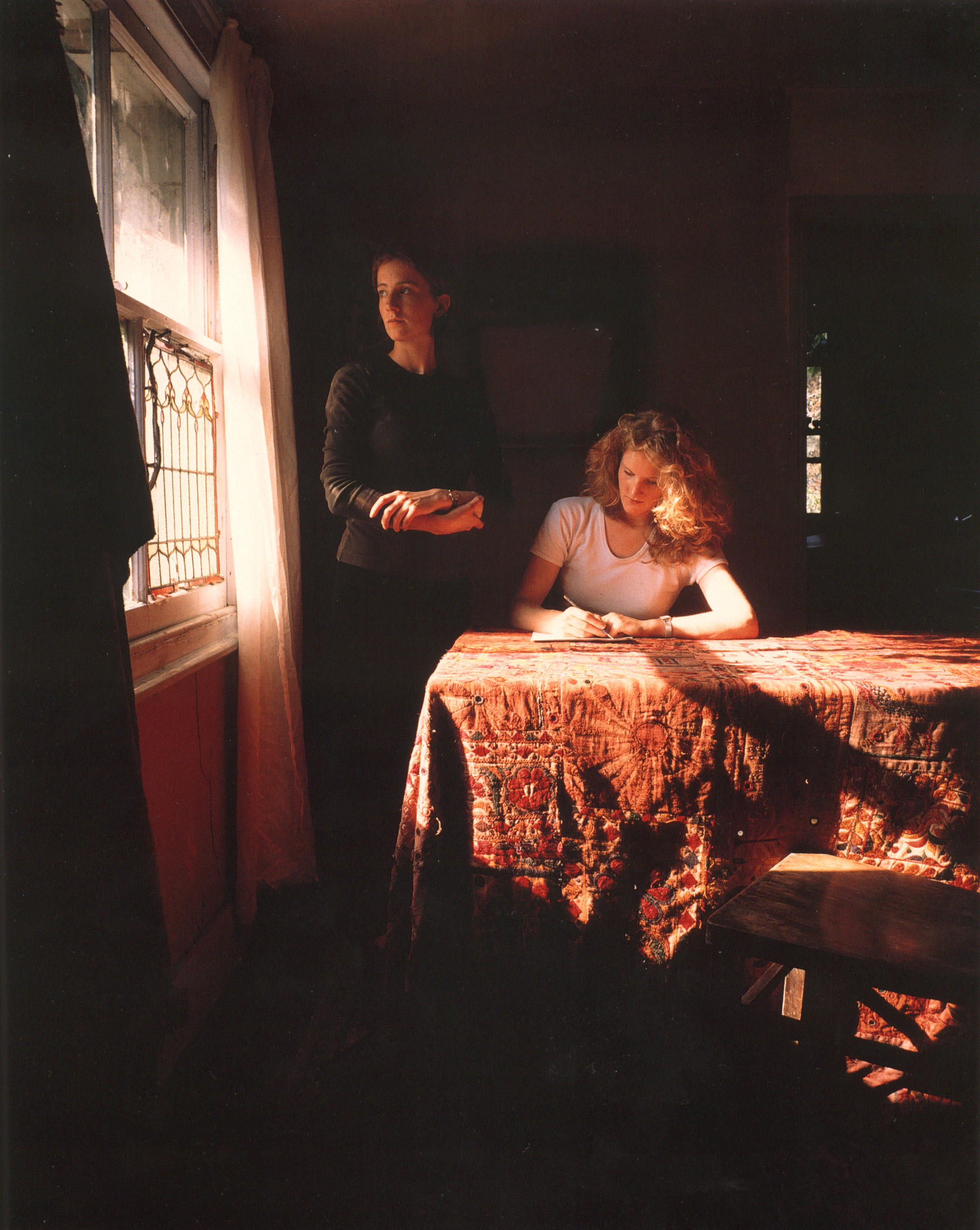 Girl Writing an Affidavit, 1997. Cibachrome print. © Tom Hunter, courtesy of the artist, and Yancey Richardson Gallery, New York
