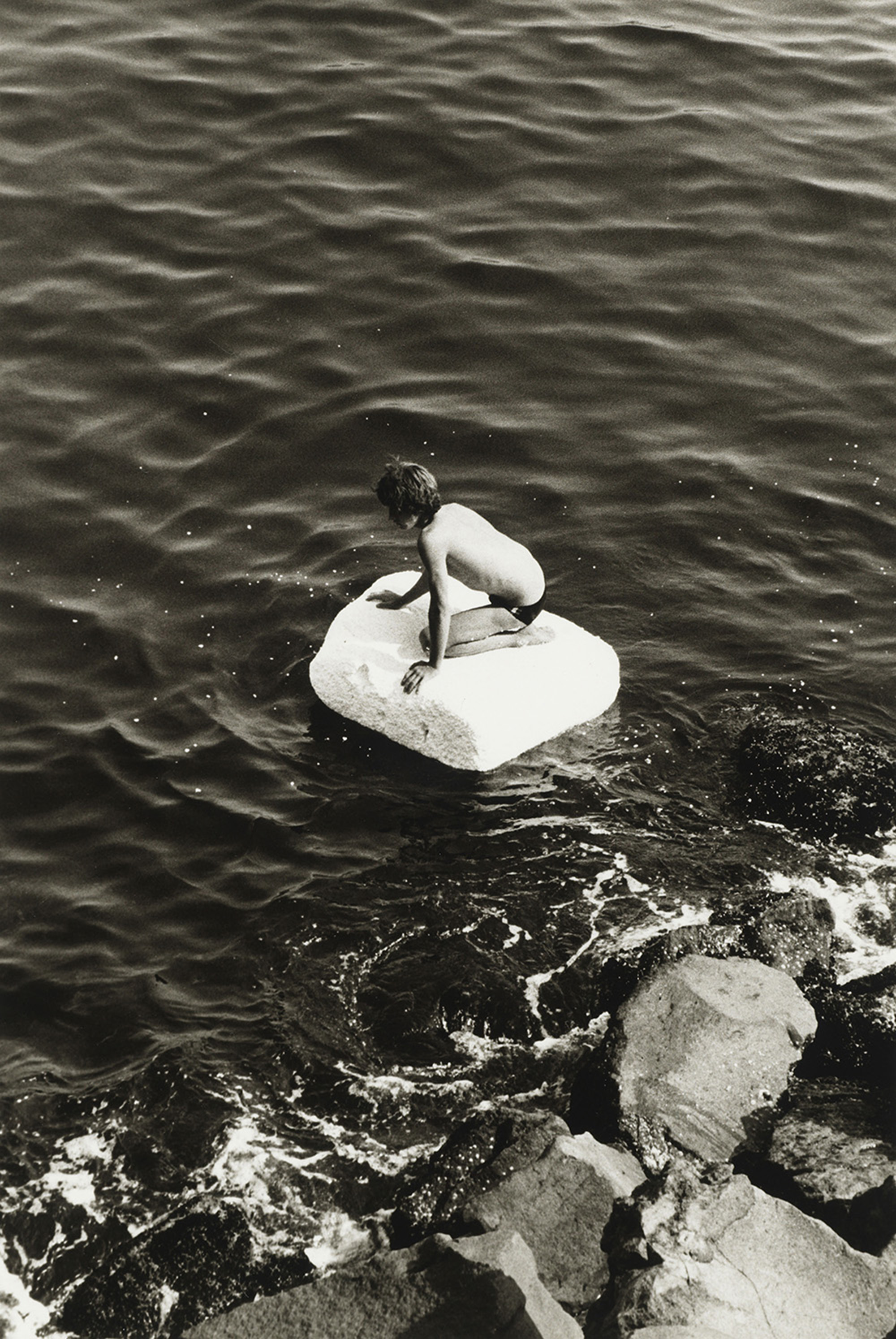 Boy on Raft, 1978, gelatin silver print, purchased on the Charina Endowment Fund, The Morgan Library & Museum, 2013.108:1.97. © Peter Hujar Archive, LLC, courtesy Pace/MacGill Gallery, New York and Fraenkel Gallery, San Francisco.