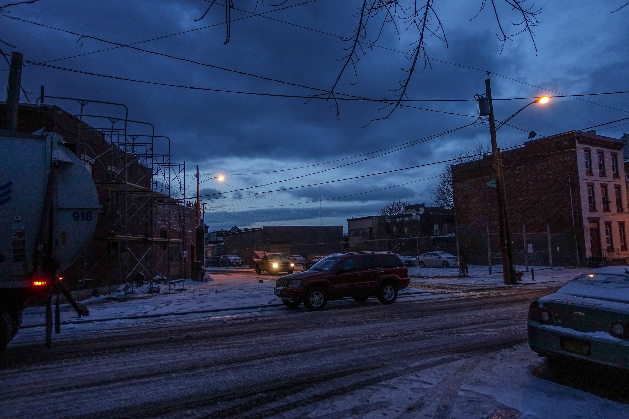 Michael_ Bach_ Early morning with garbage truck, Church Street Alley and Adams Street, Troy, New York, February 2018.jpg