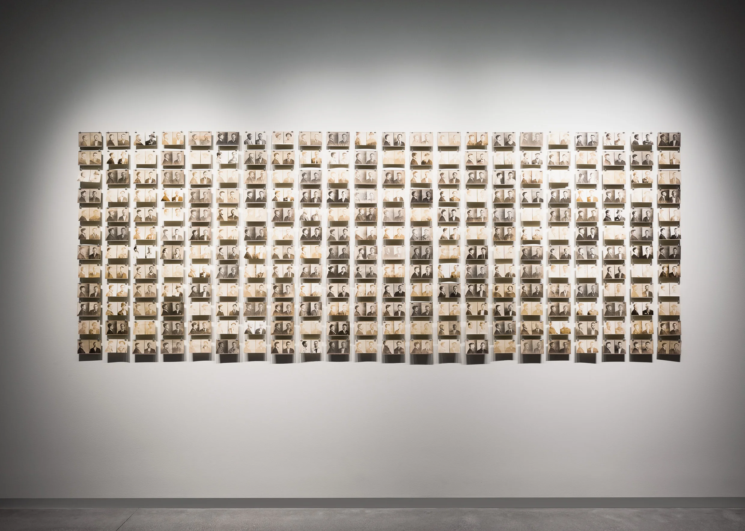 Photographer Unknown, Mugshots, Scranton, Pennsylvania, 1900s–1940s, installation view, About Face, Pier 24 Photography, San Francisco.