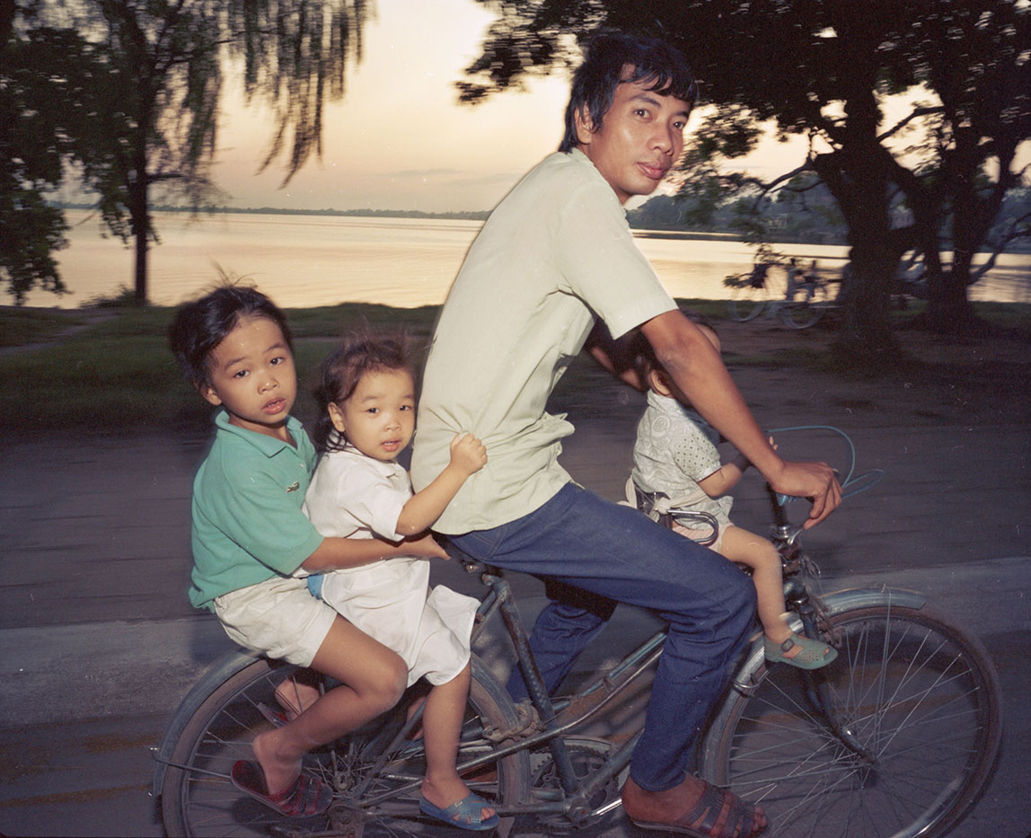 Motorbike and Bicycle Going Home, 1987 © William E. Crawford, 2018
