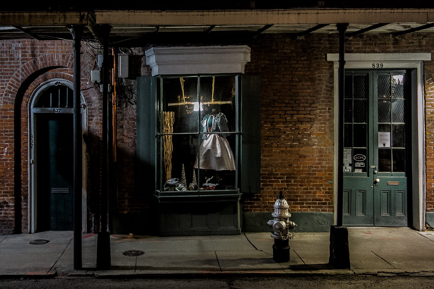 Window dress, copper pipe French Quarter Chartres Street New Orleans, Louisiana.jpg