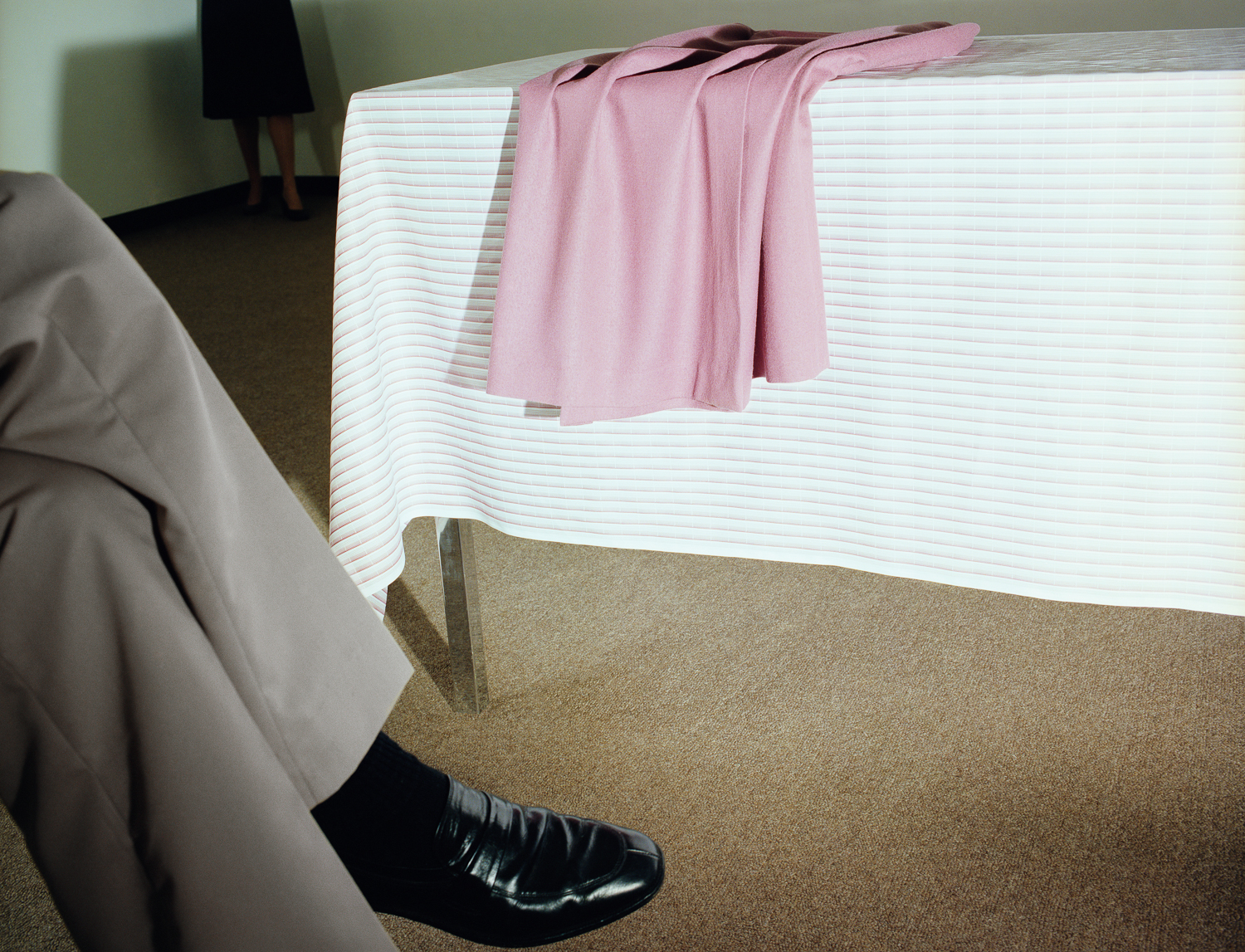 Now and Then © Jo Ann Callis Man with Black Shoe , 1979, Archival Pigment Print, 24 x 30 inches