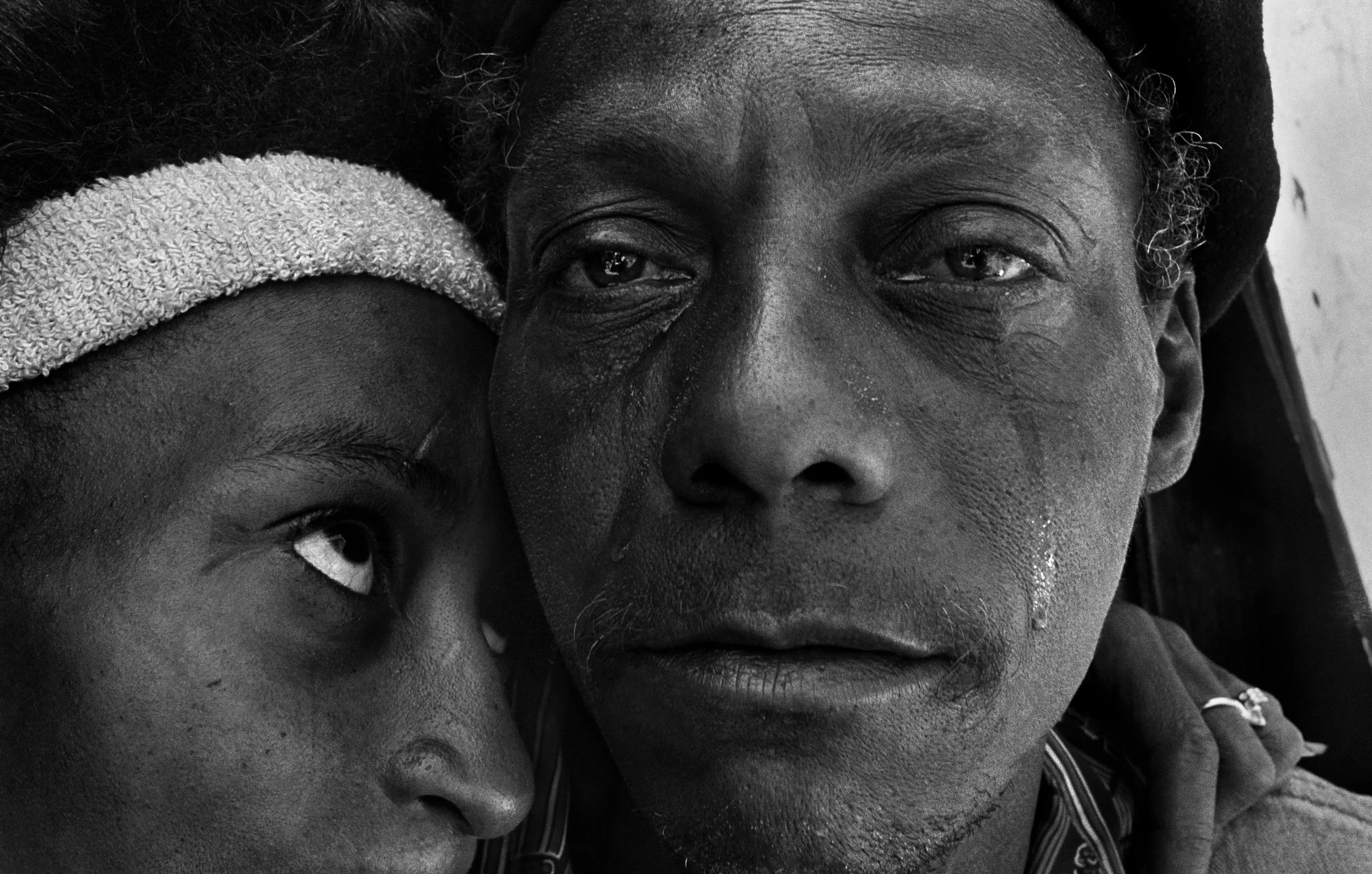 Back from prison, Shantytown, New York , 1986. Gelatin silver print. Collection of Eugene Richards. © Eugene Richards