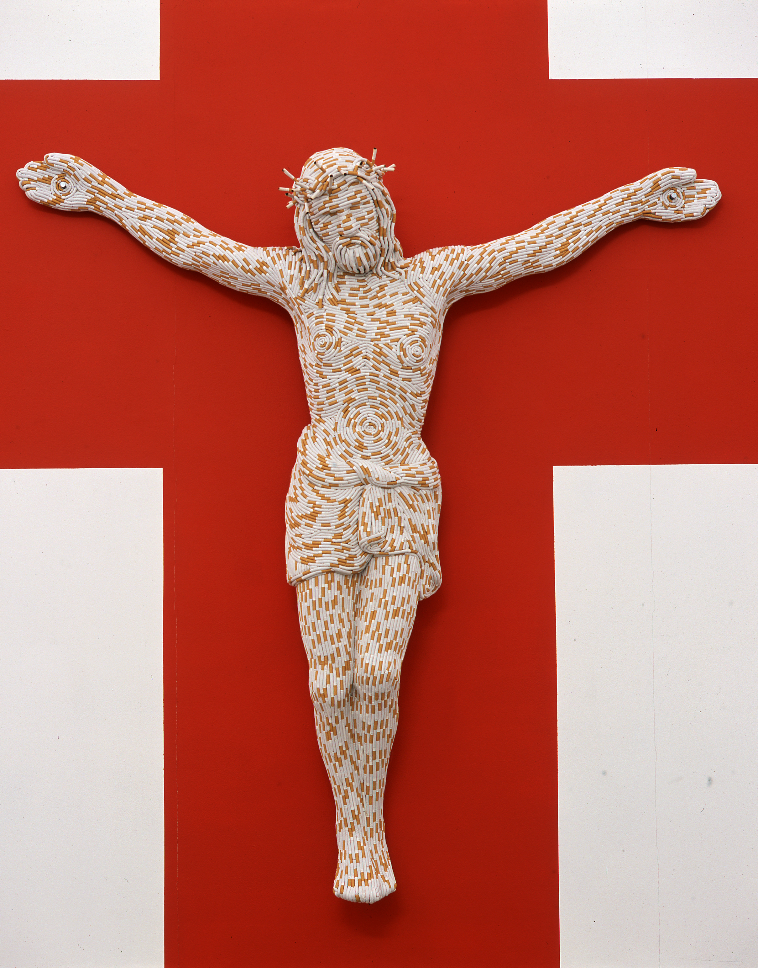 Christ You Know It Ain’t Easy, 2003 Fiberglass and cigarettes 77 x 72 x 16 in (195.6 x 182.9 x 40.6 cm) Courtesy the artist and Sadie Coles HQ, London