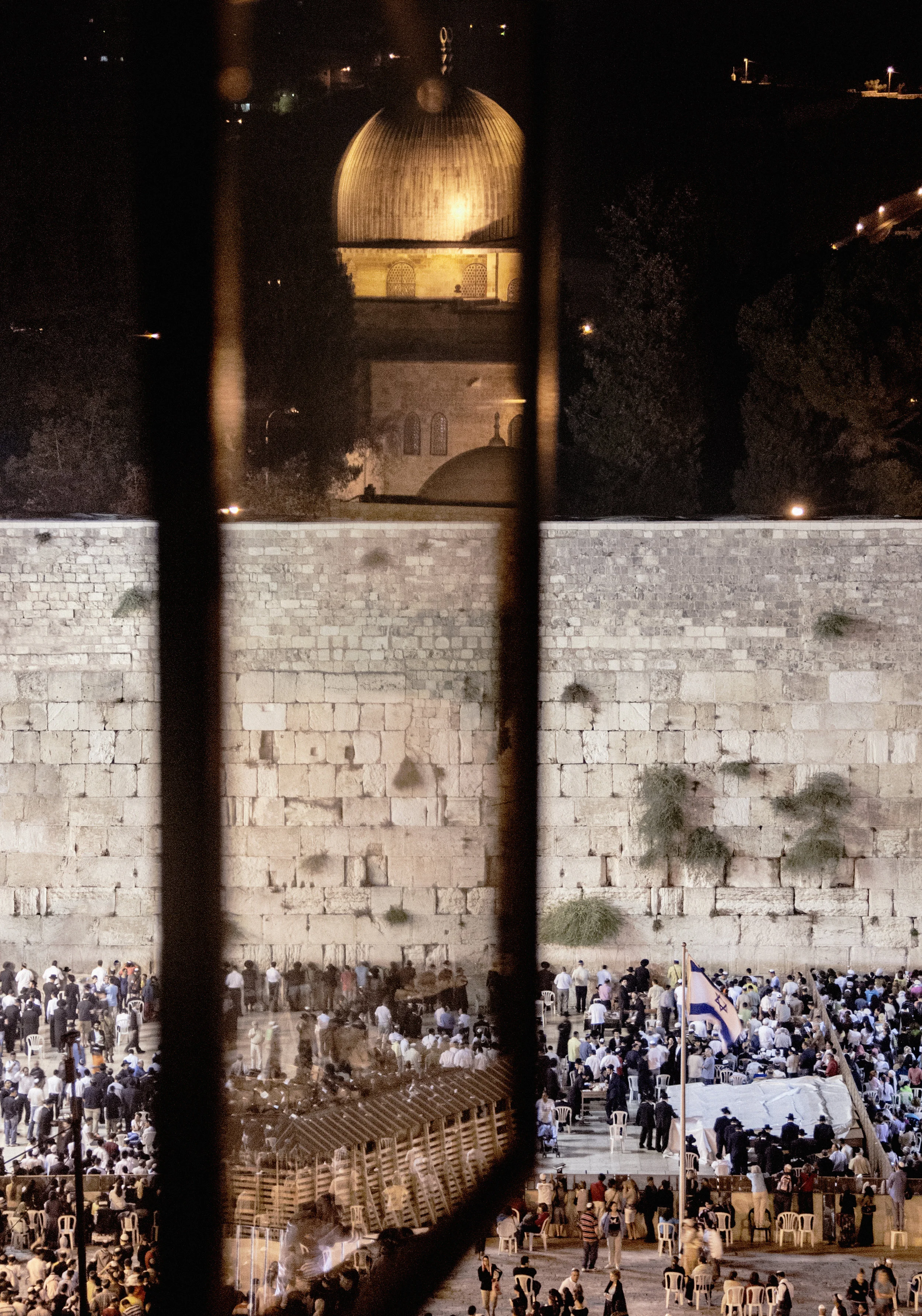 The Al-Aqsa Dome reflected over the Western Wall. From Under My Window by Michal Safdie, published by powerHouse Books.
