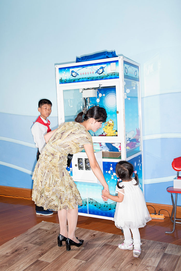 Families enjoying the National Liberation Day (Aug.15) at the Rungna Dolphinarium, Pyongyang. © Max Pinckers
