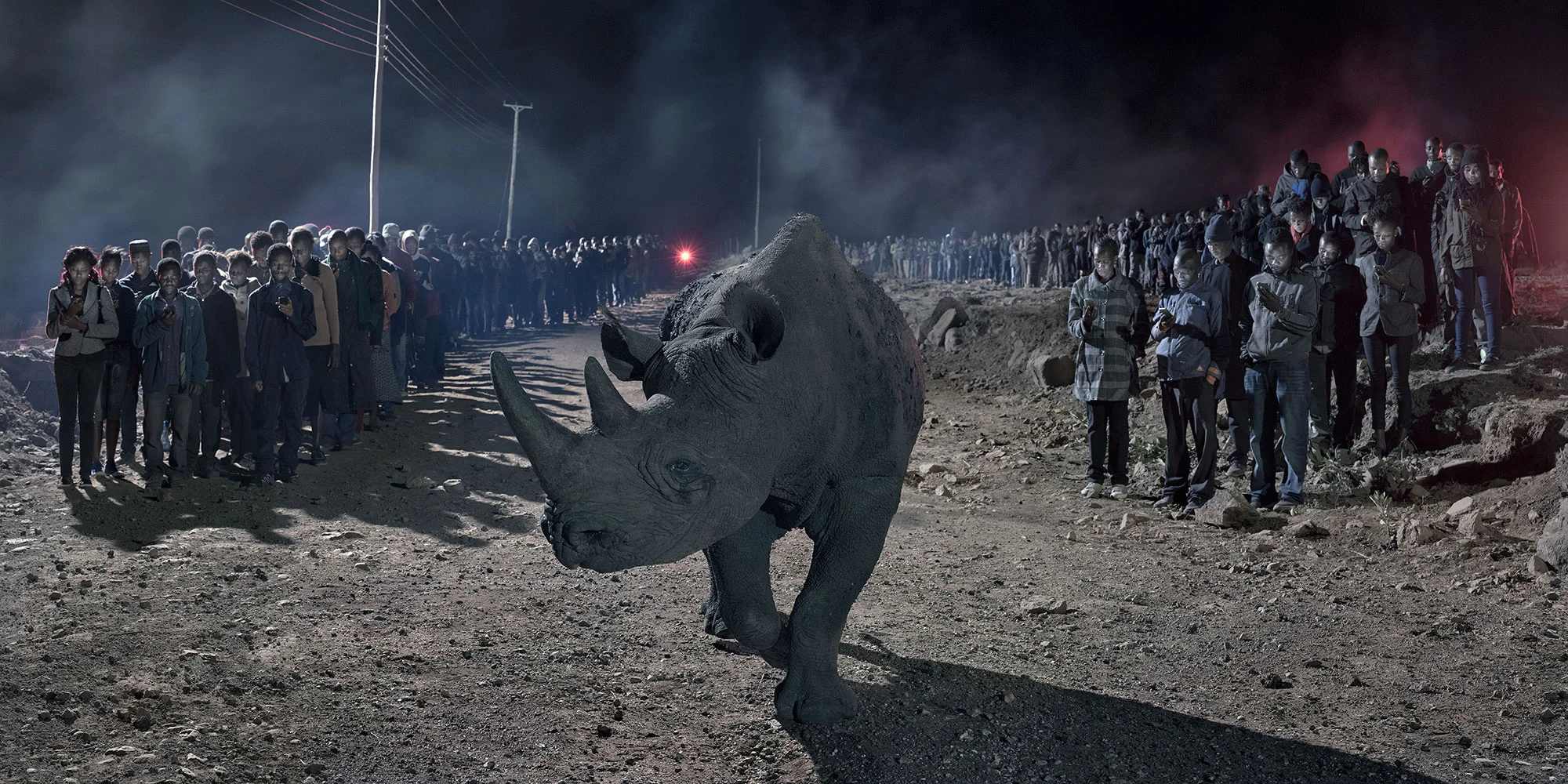 River of People With Blind Rhino. Copyright Nick Brandt.