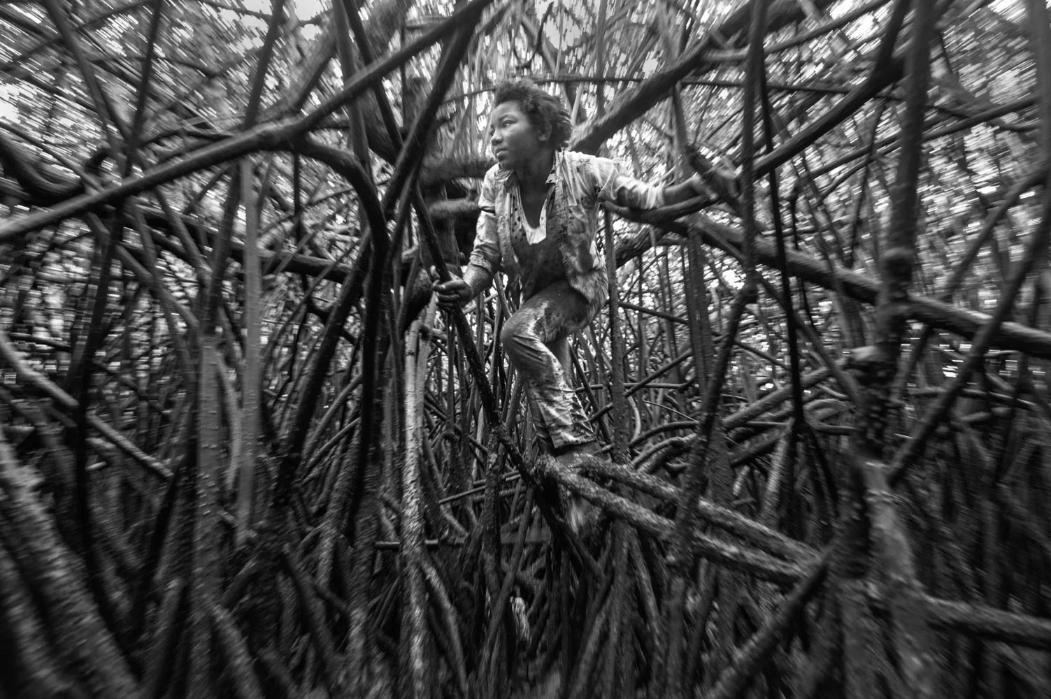 Alejandra Bones has 3 brothers and sisters. She is the only one of her siblings that picks shells to contribute to the family´s income. Cayapas Mataje Reserve, Ecuador. 2014