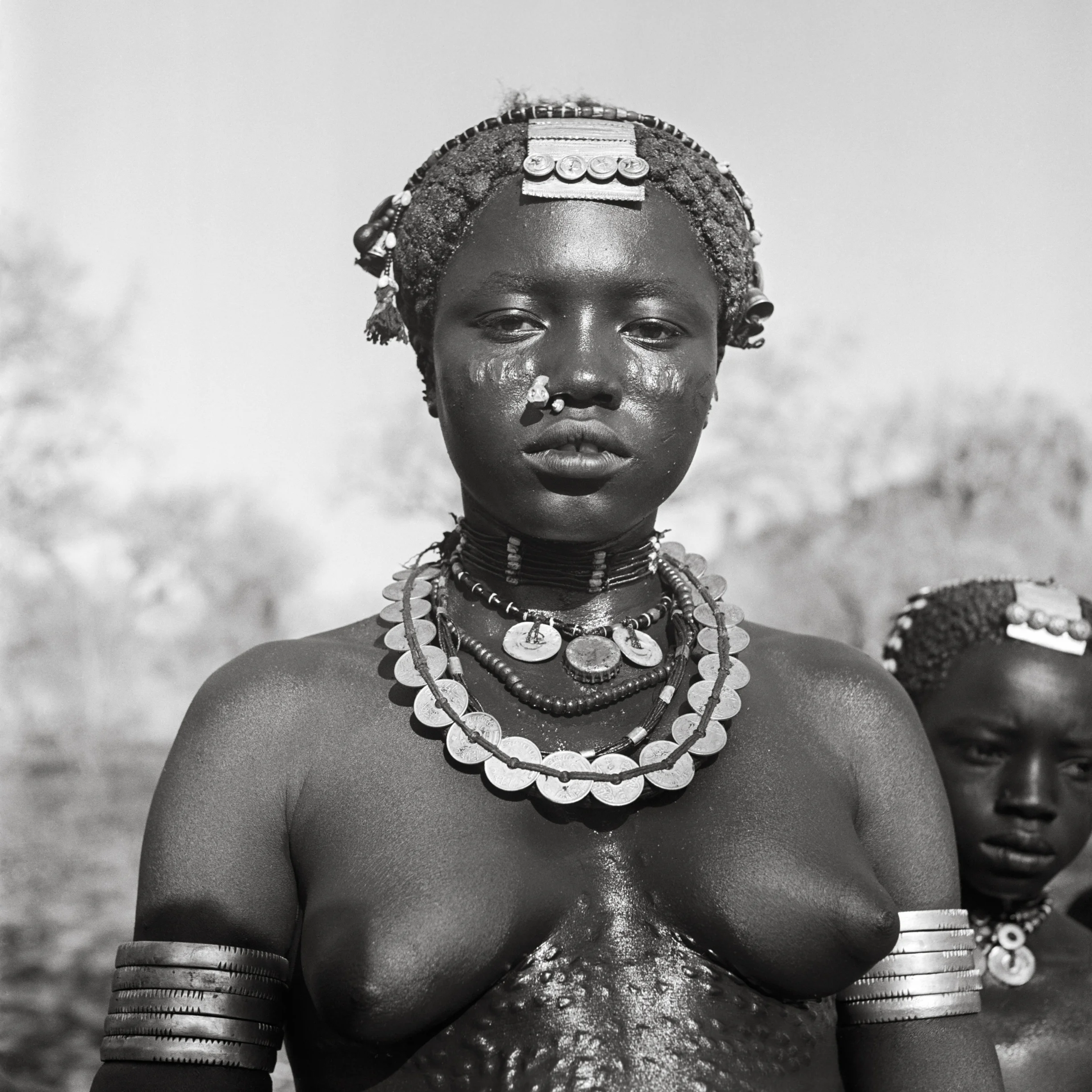 Women of the Koalib Nuba from Delami, 1949. ©George Rodger, from Southern Sudan . Published by Stanley/Barker.