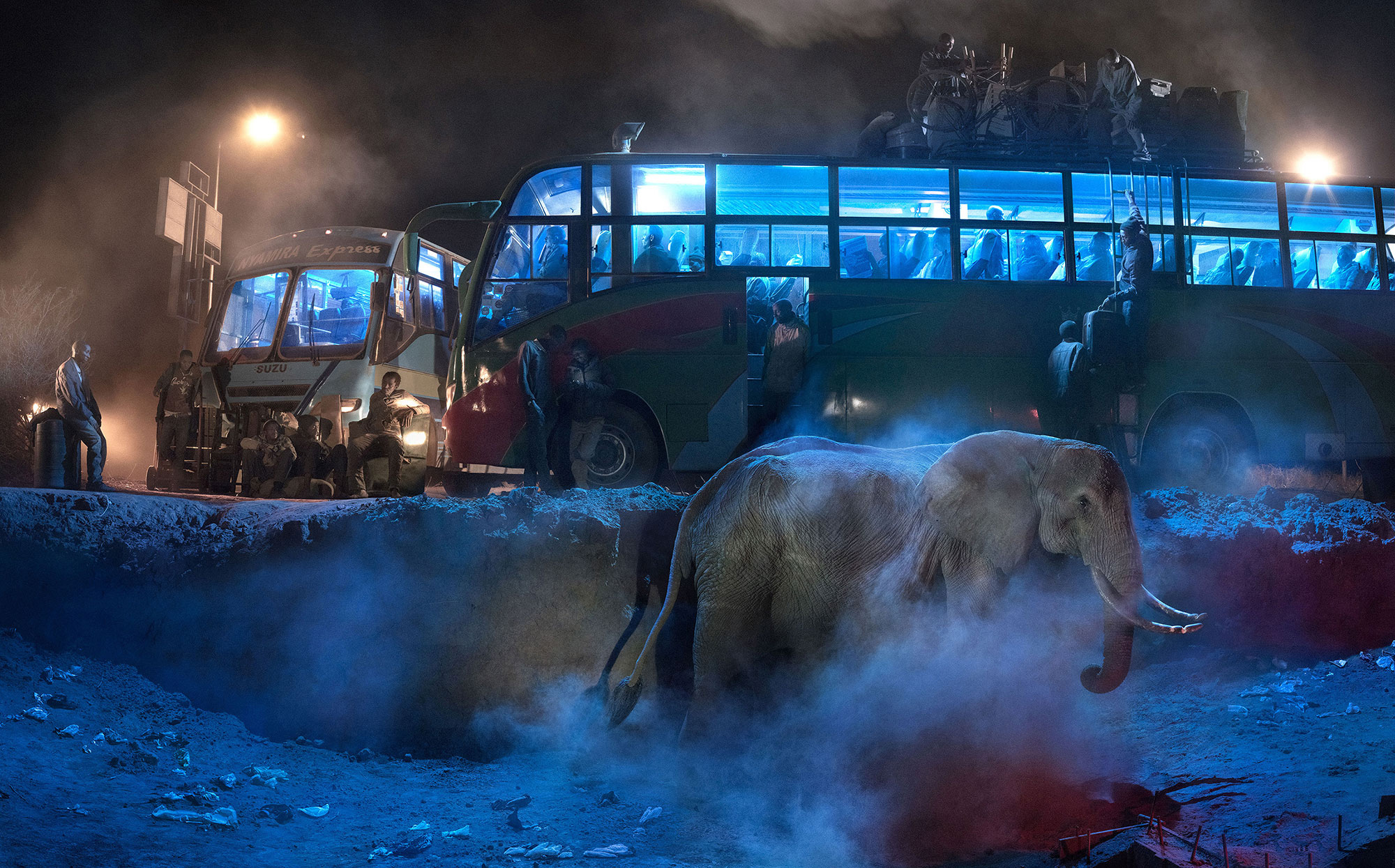 Bus Station with Elephant in Dust. © Nick Brandt