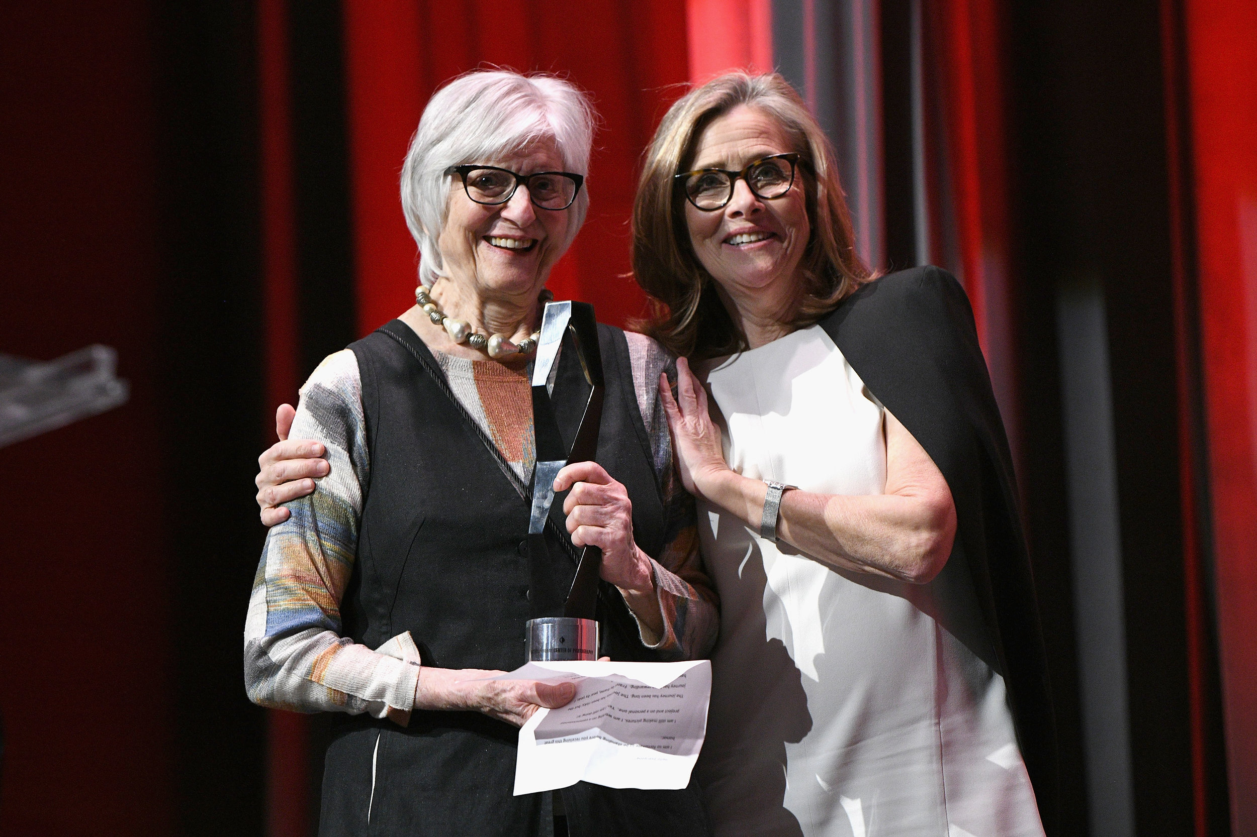NEW YORK, NY - APRIL 02: Honoree and photographer Rosalind Fox Solomon and host Meredith Vieira pose onstage during The International Center Of Photography's 35th Annual Infinity Awards at The Ziegfeld Ballroom on April 2, 2019 in New York City. (Photo by Bryan Bedder/Getty Images for International Center of Photography)