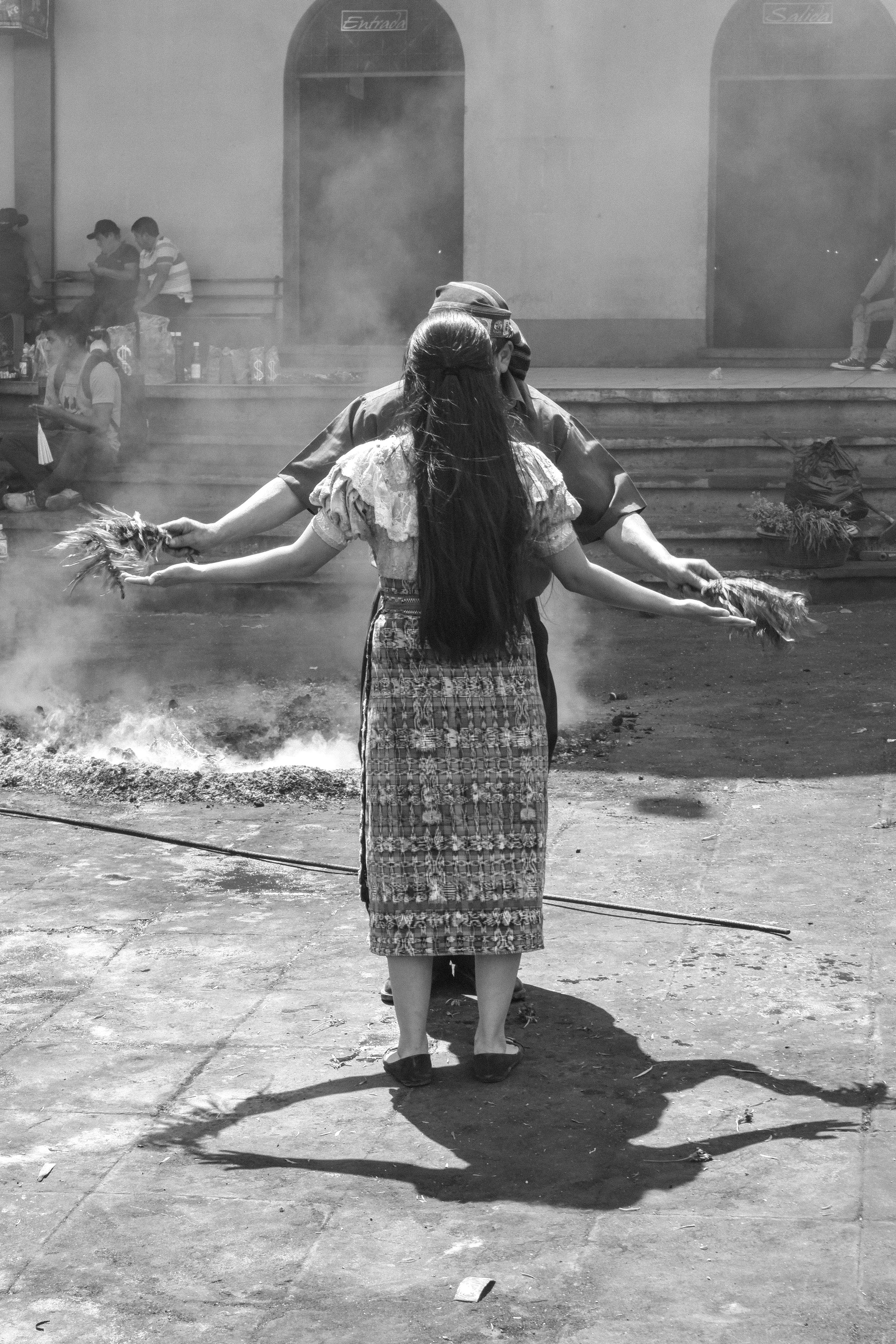 A Maya woman is blessed by a priest with herbs during a healing ceremony at Maximon, the San Simon Temple in San Andrés Itzapa, Guatemala. This is often the first step by the Maya in seeking proper healthcare, a dysfunctional system that has greatly failed the Maya people by Guatemalan government. © Cory Zimmerman, Assade NGO
