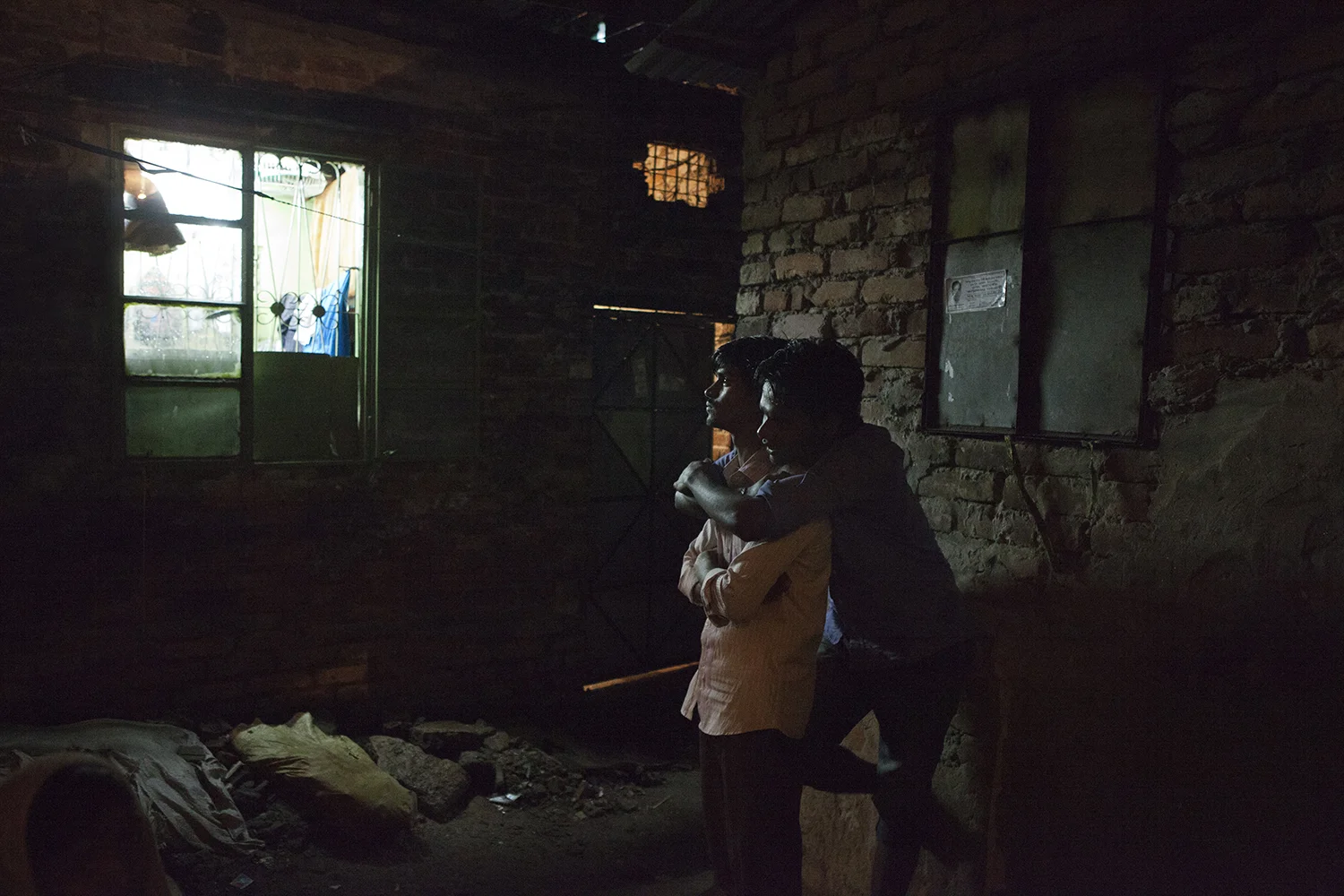 Imrul and Shakil, homosexual lovers. Every night they meet in secret on the narrows of the Pakistani Ghetto. Dhaka city. © Raffele Petralla